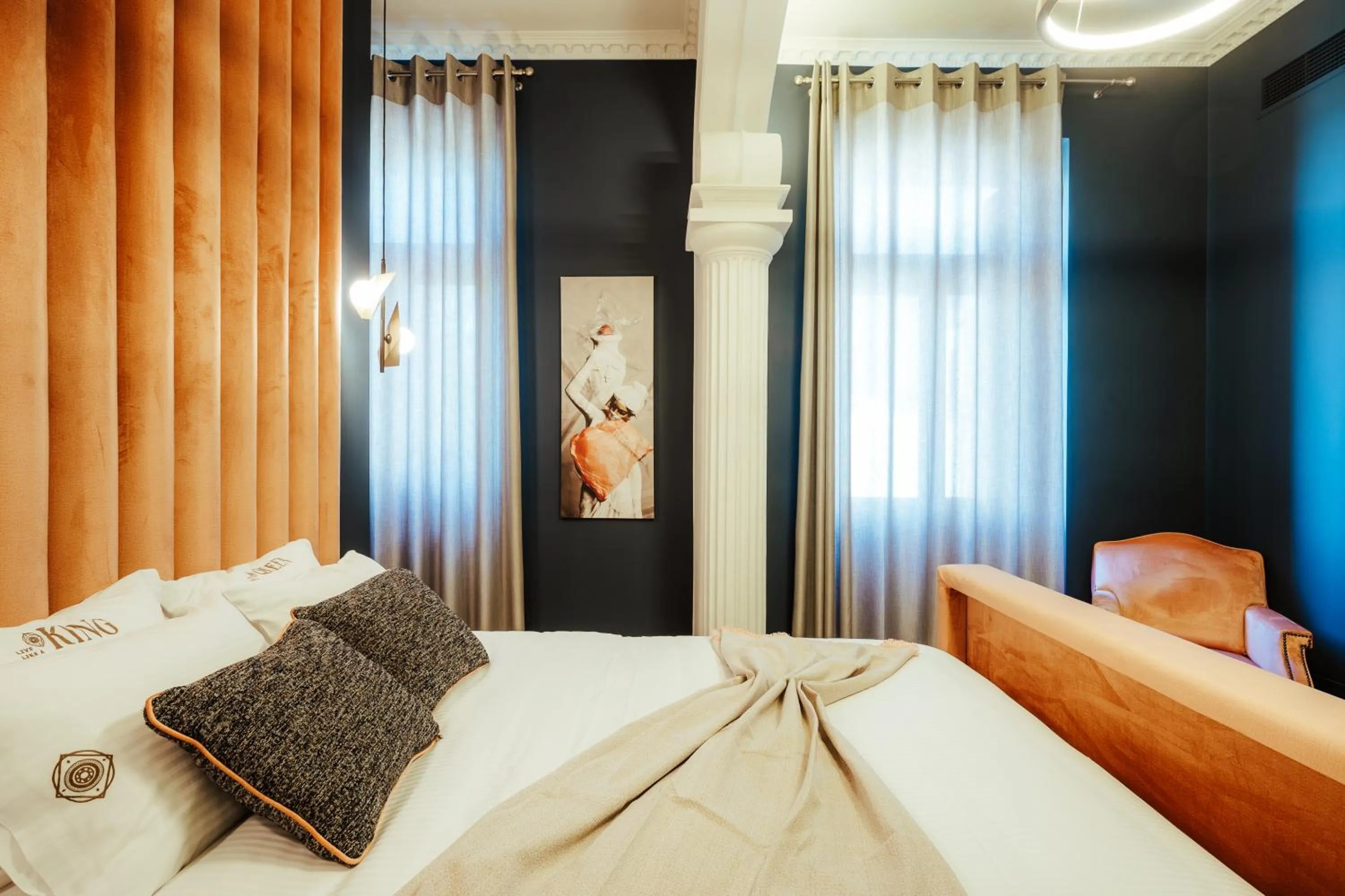 Bed in Espero Royal Stay