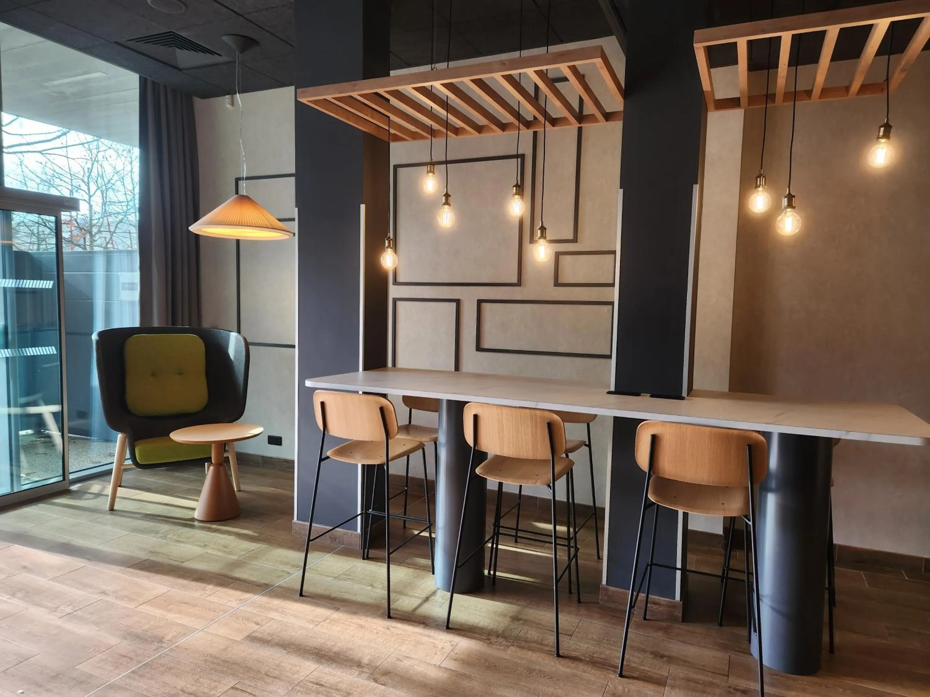 Communal lounge/ TV room in Campanile La Roche Sur Yon Centre Gare