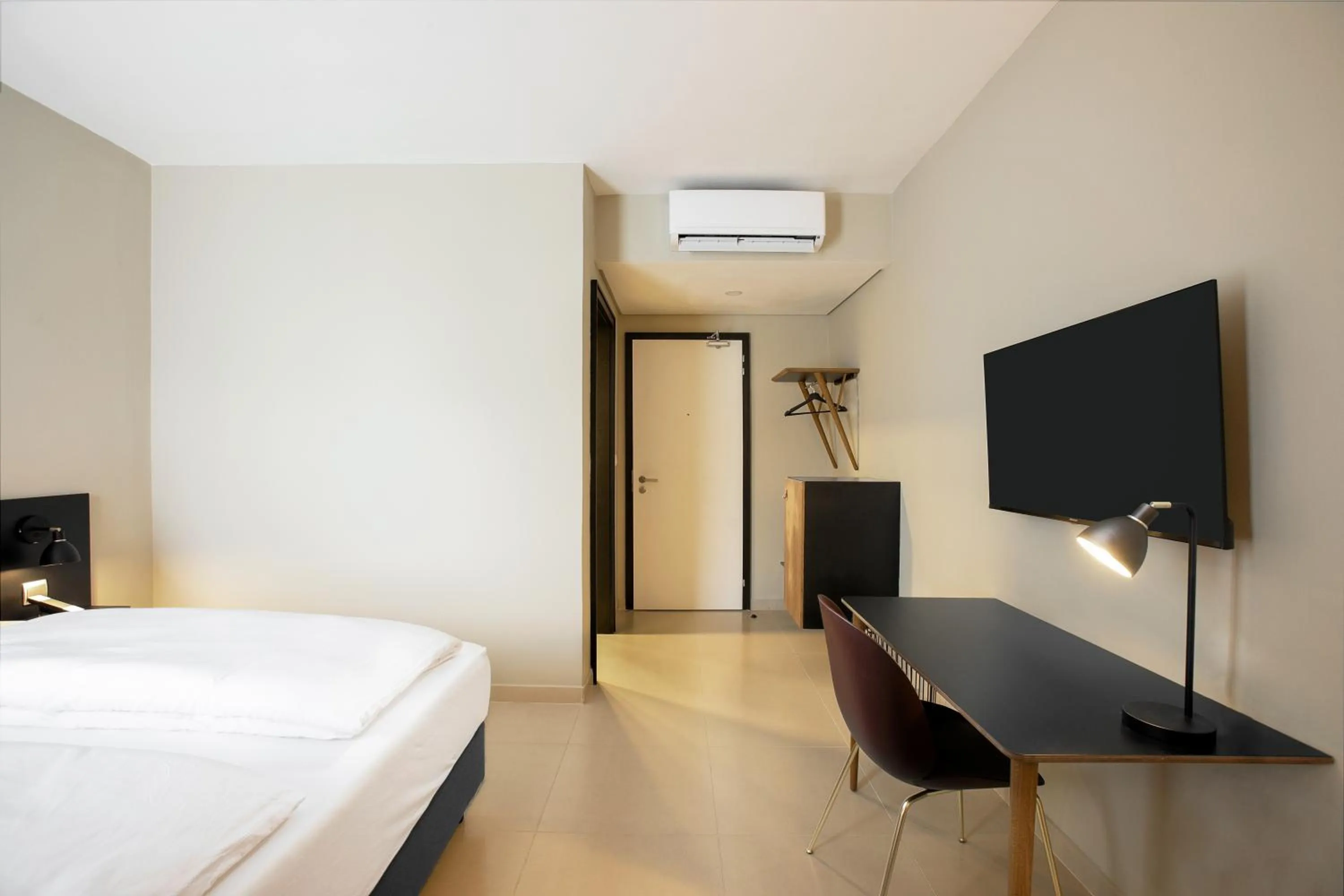TV and multimedia, Bed in Nordic Hotel Lagos