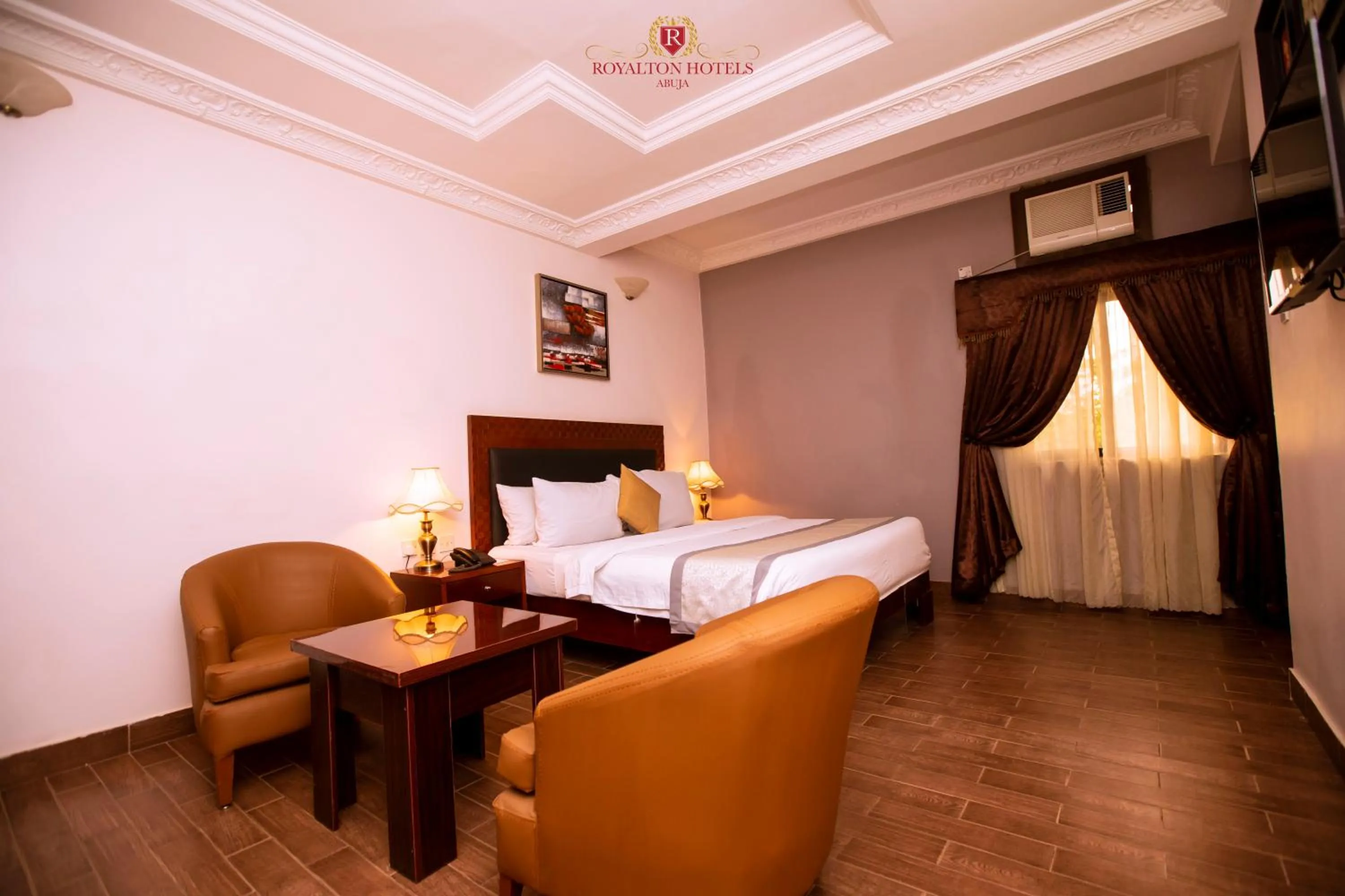 Photo of the whole room, Bed in Royalton Hotels Abuja