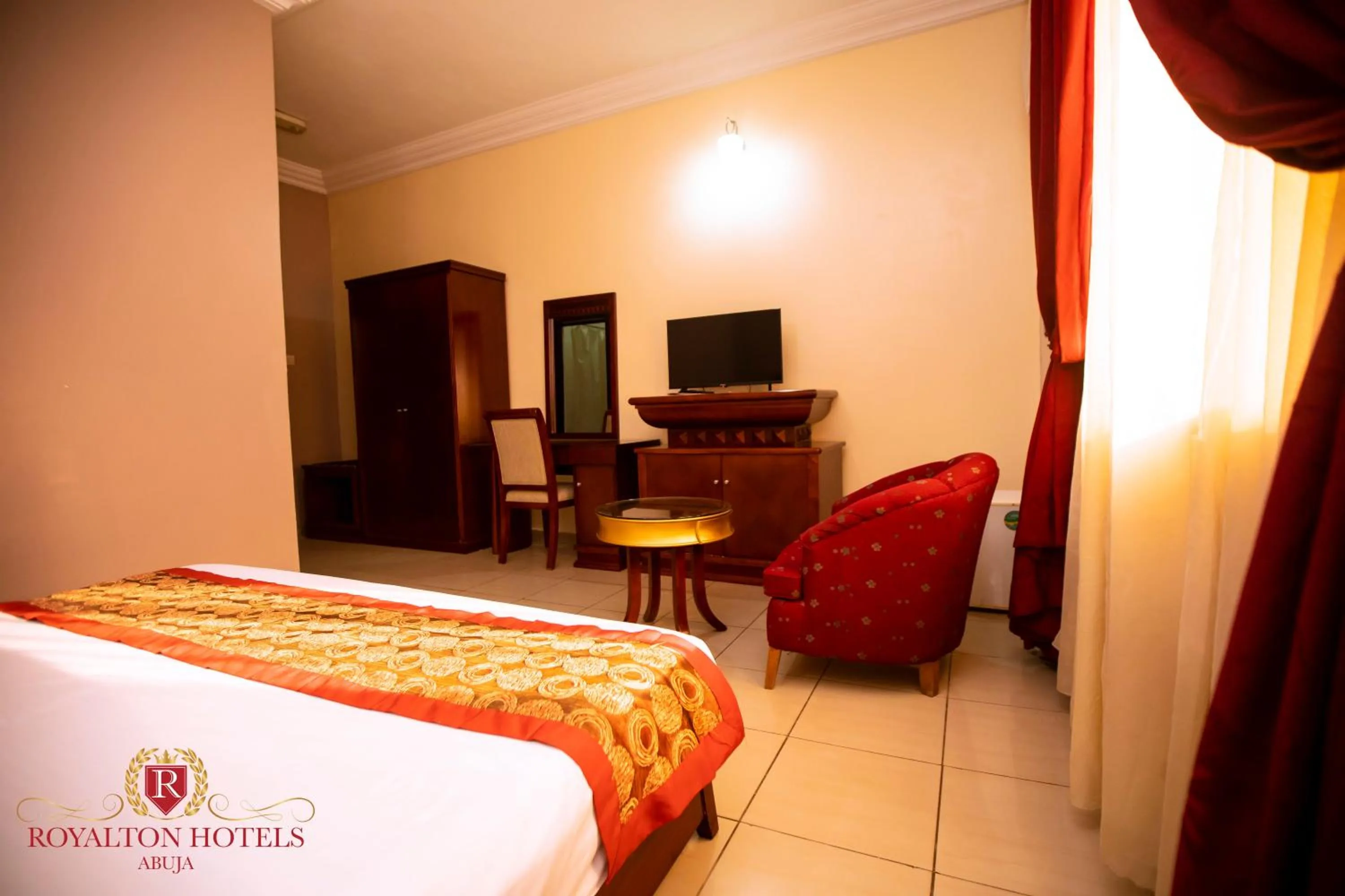 TV and multimedia, Bed in Royalton Hotels Abuja