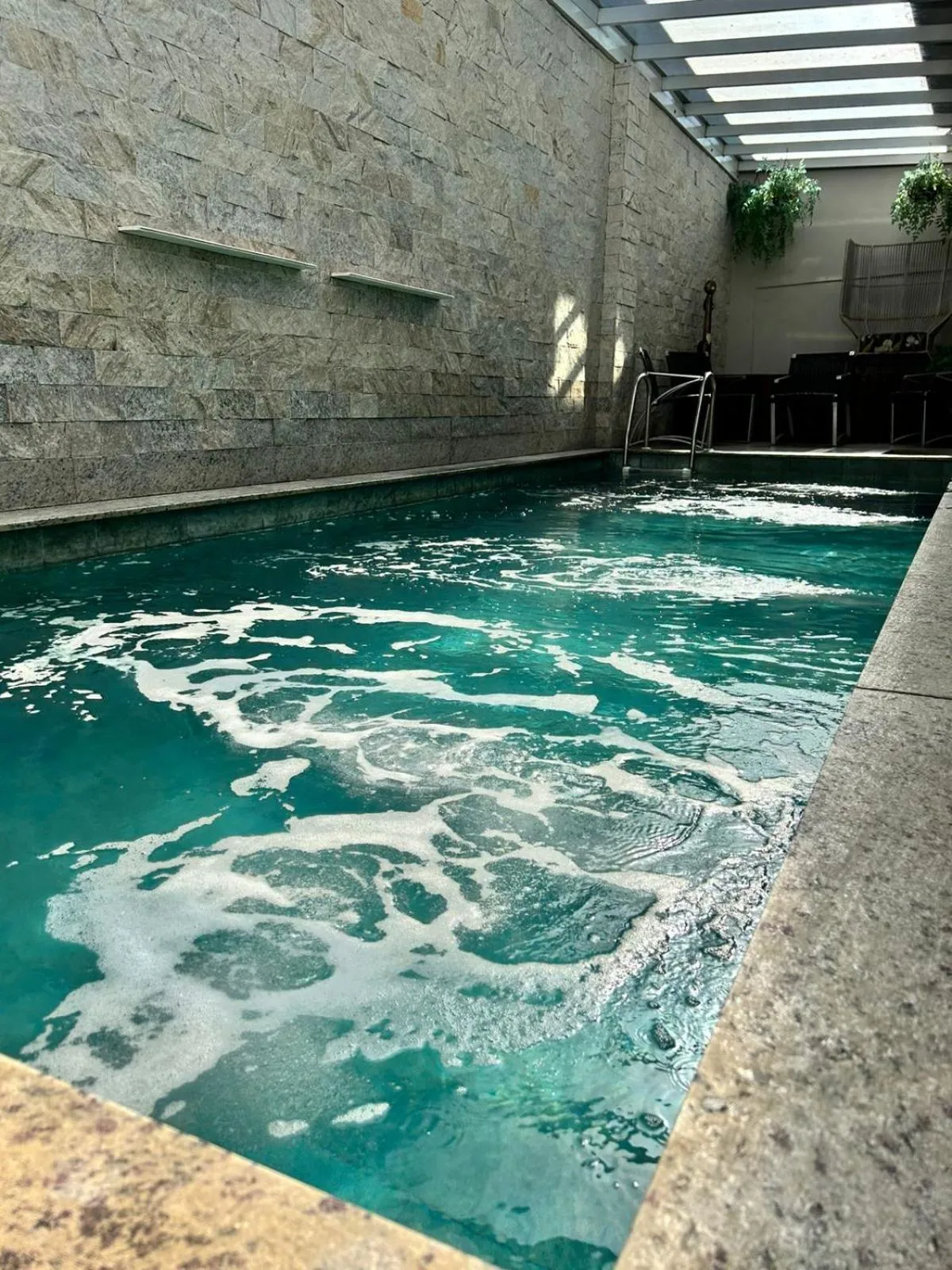 Swimming pool in Hotel Palmas Executivo