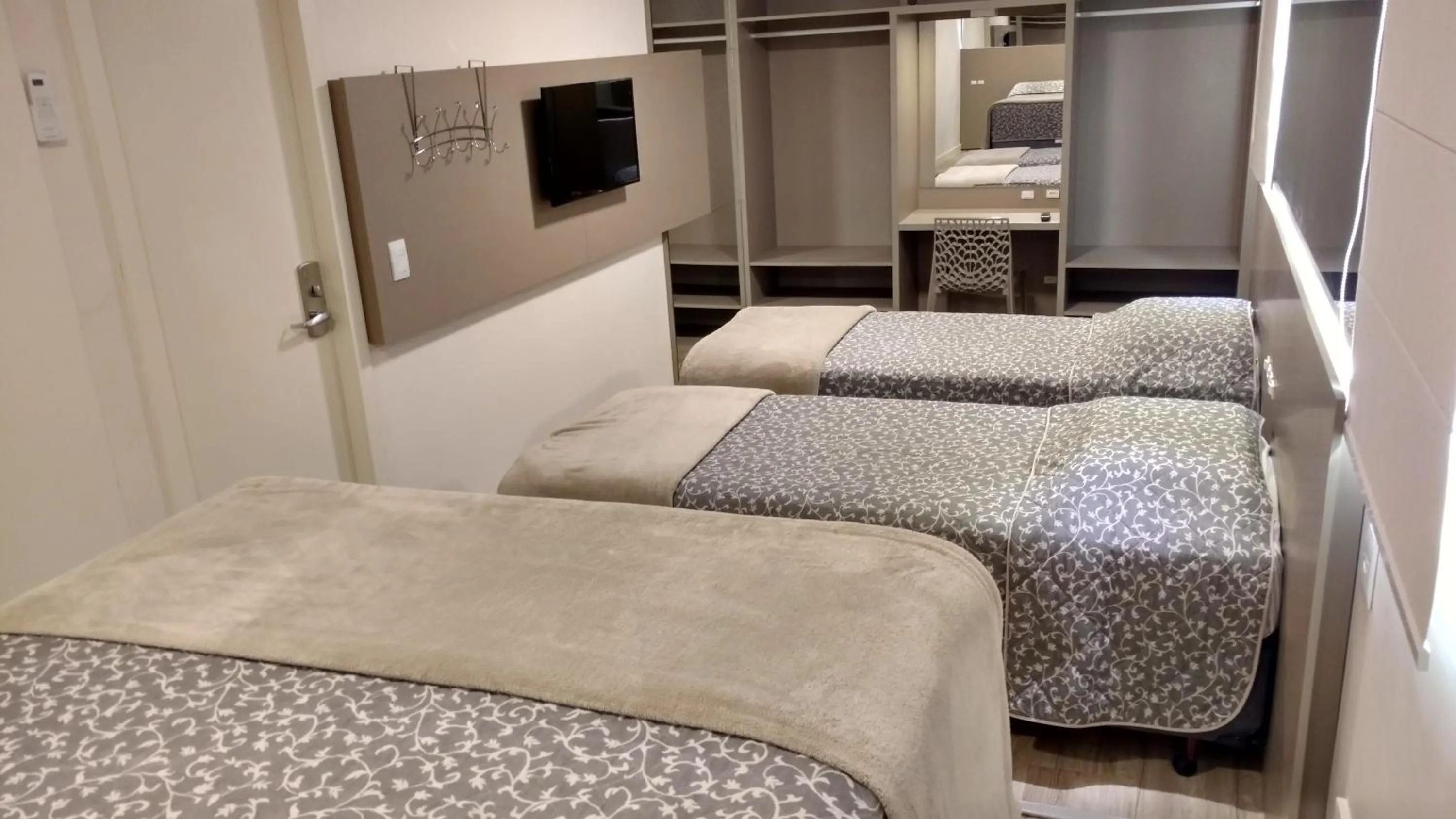 Bed in Hotel Palmas Executivo