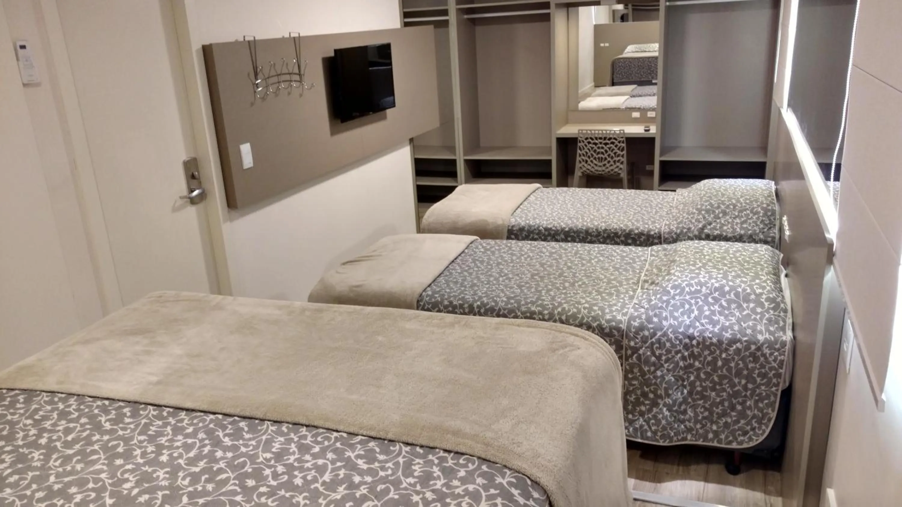 Bed in Hotel Palmas Executivo