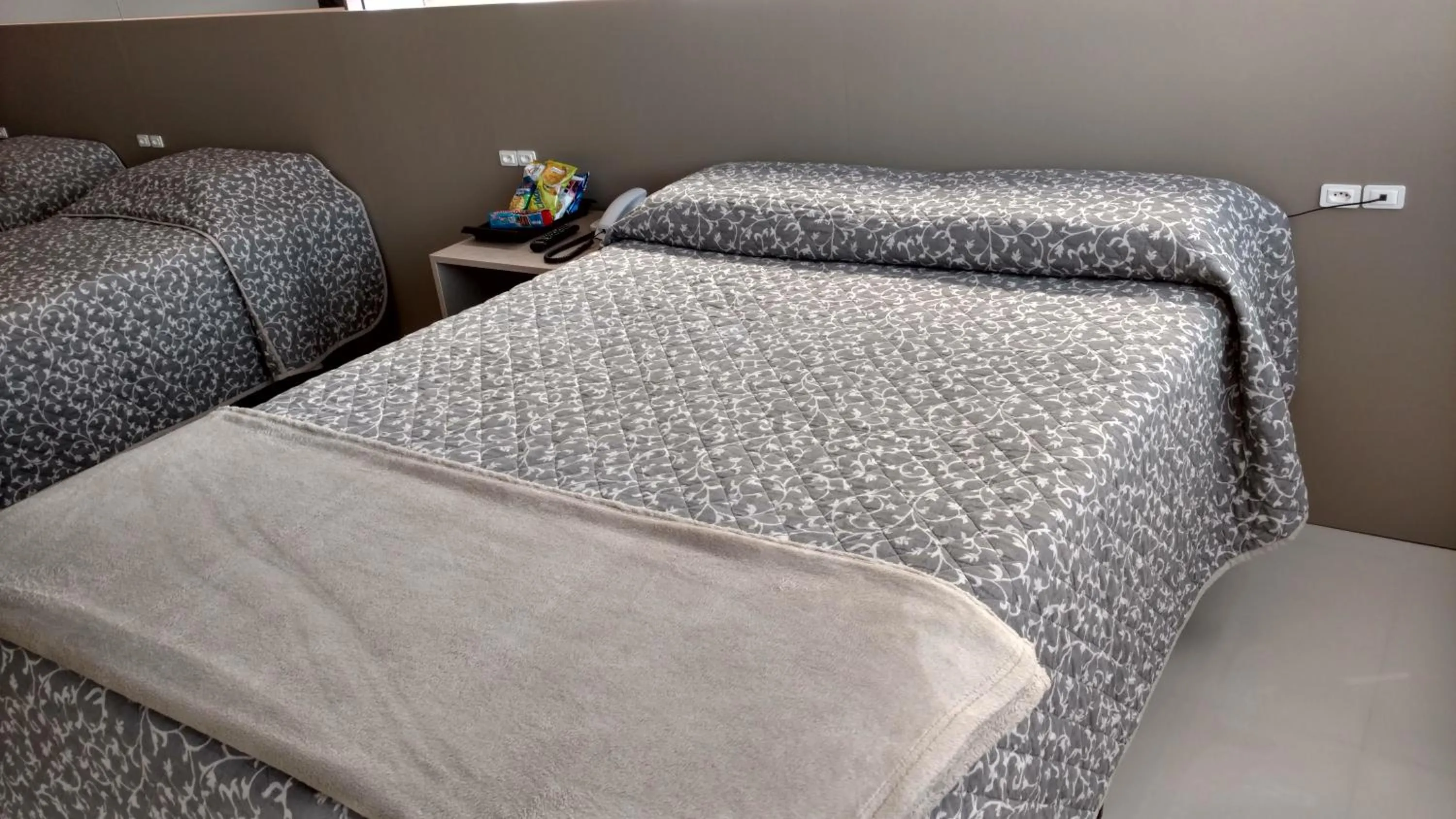 Bed in Hotel Palmas Executivo