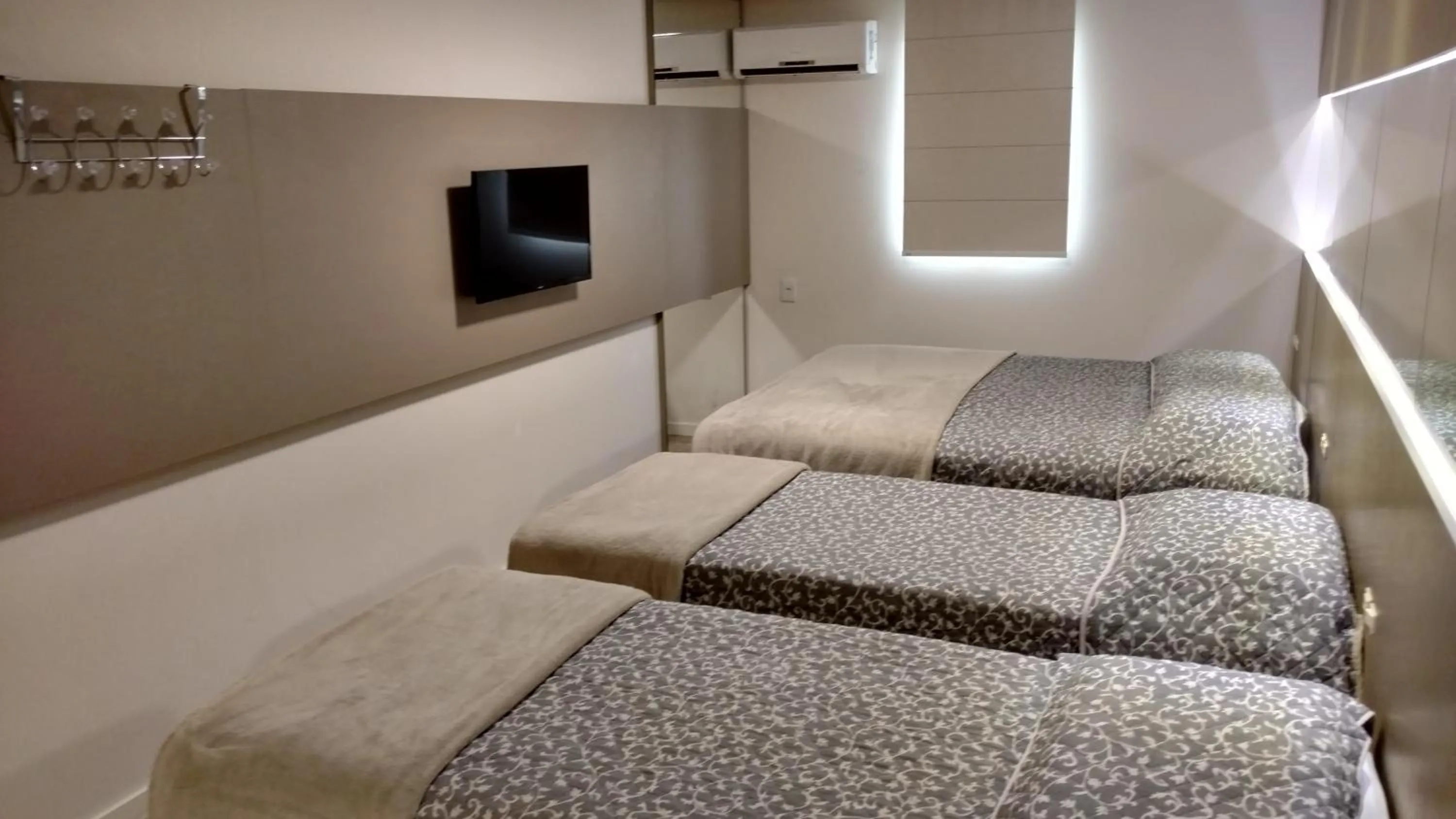 Bed in Hotel Palmas Executivo