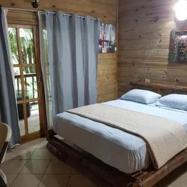 Bed in Hotel Bugabutik