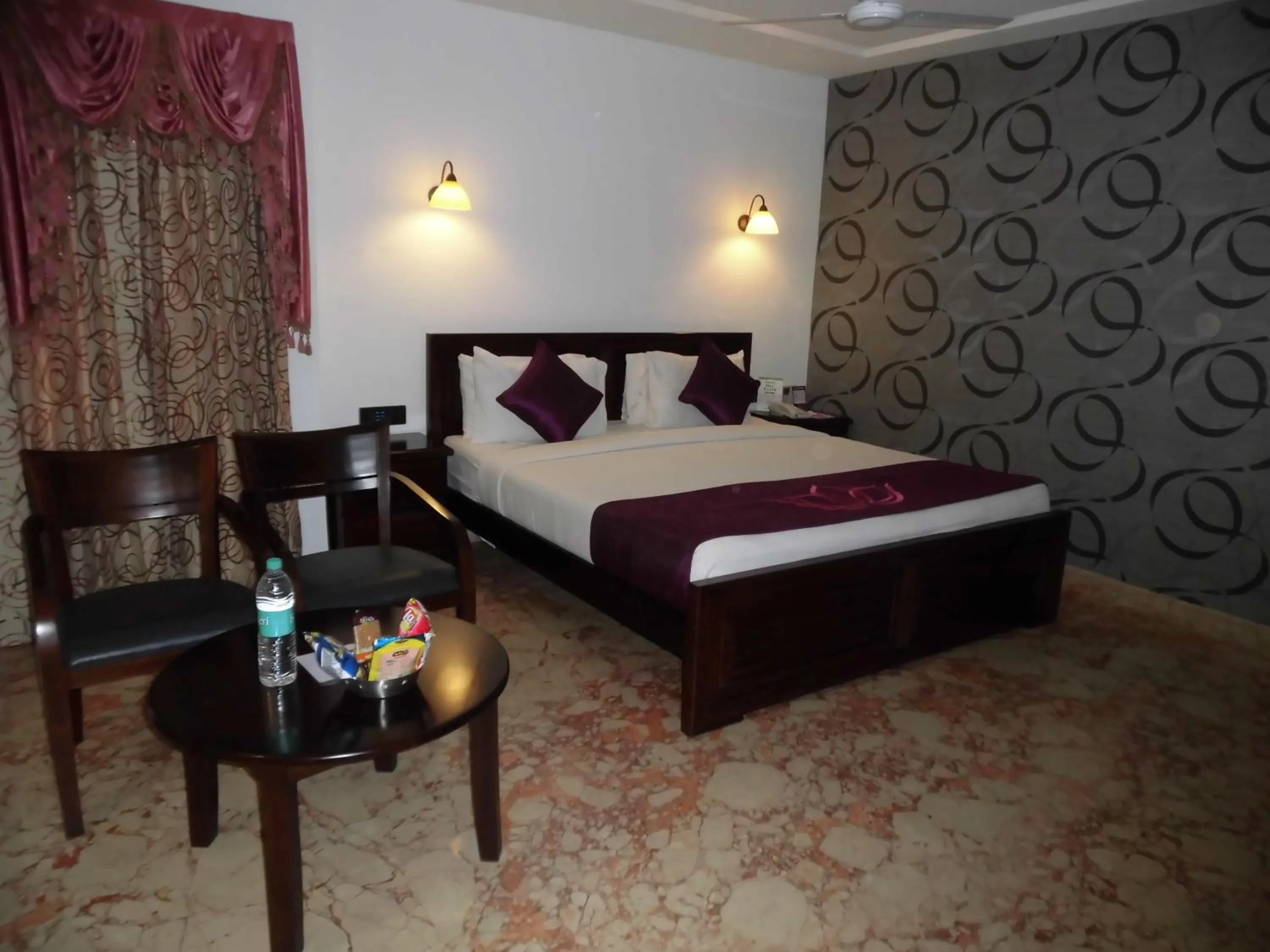 Bedroom in Lakshmi Hotel