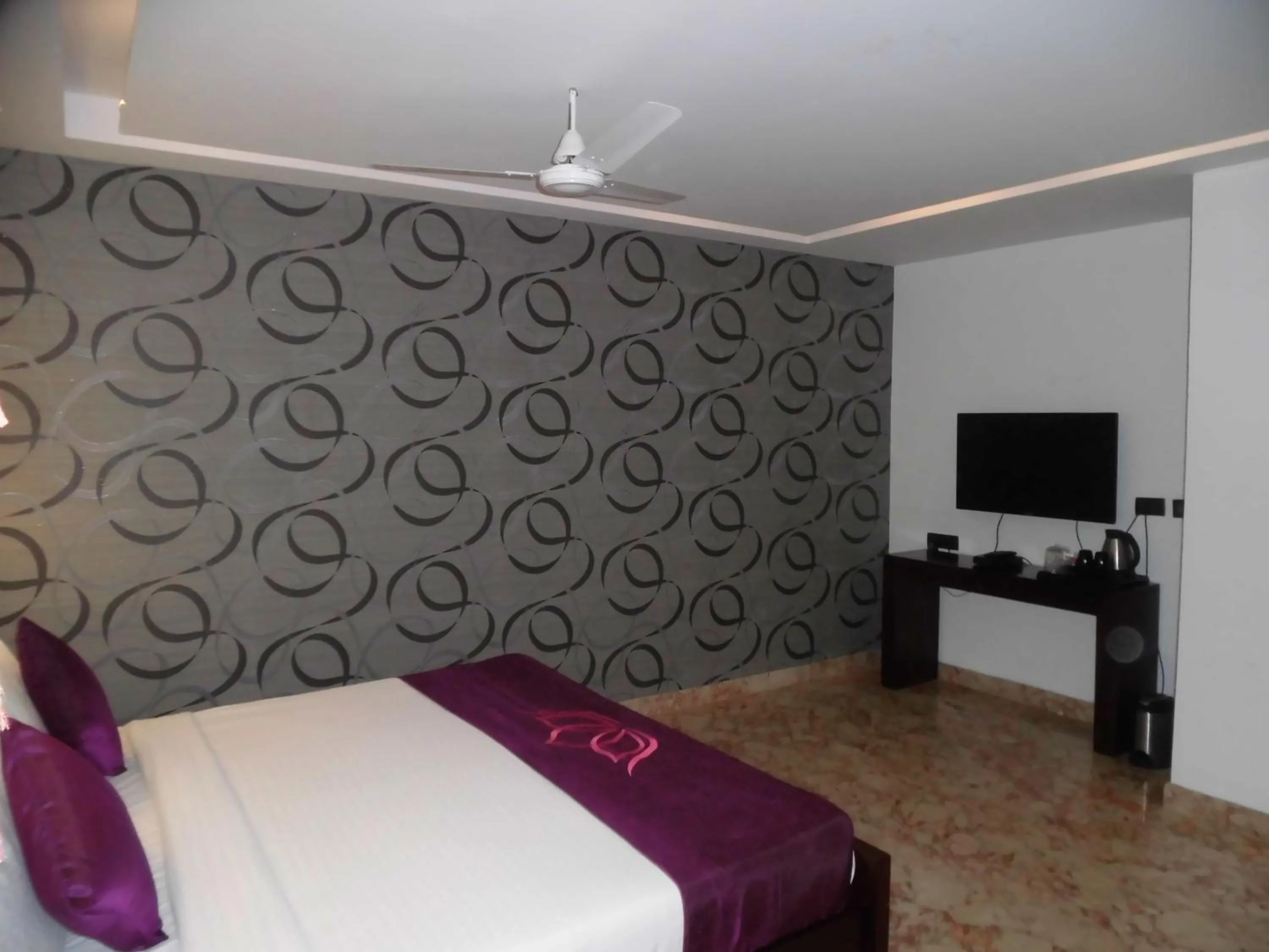 Bedroom in Lakshmi Hotel