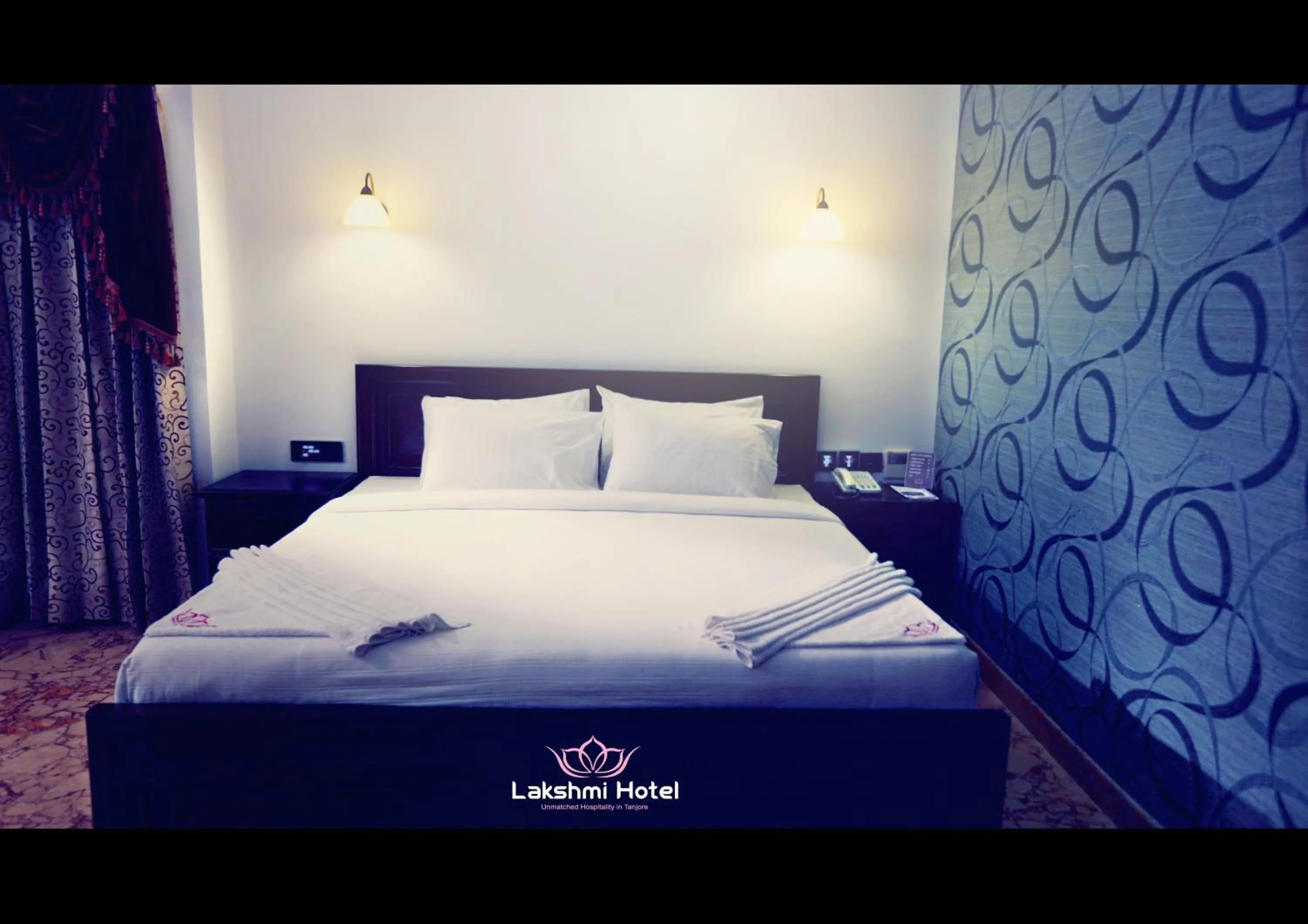 Bedroom in Lakshmi Hotel