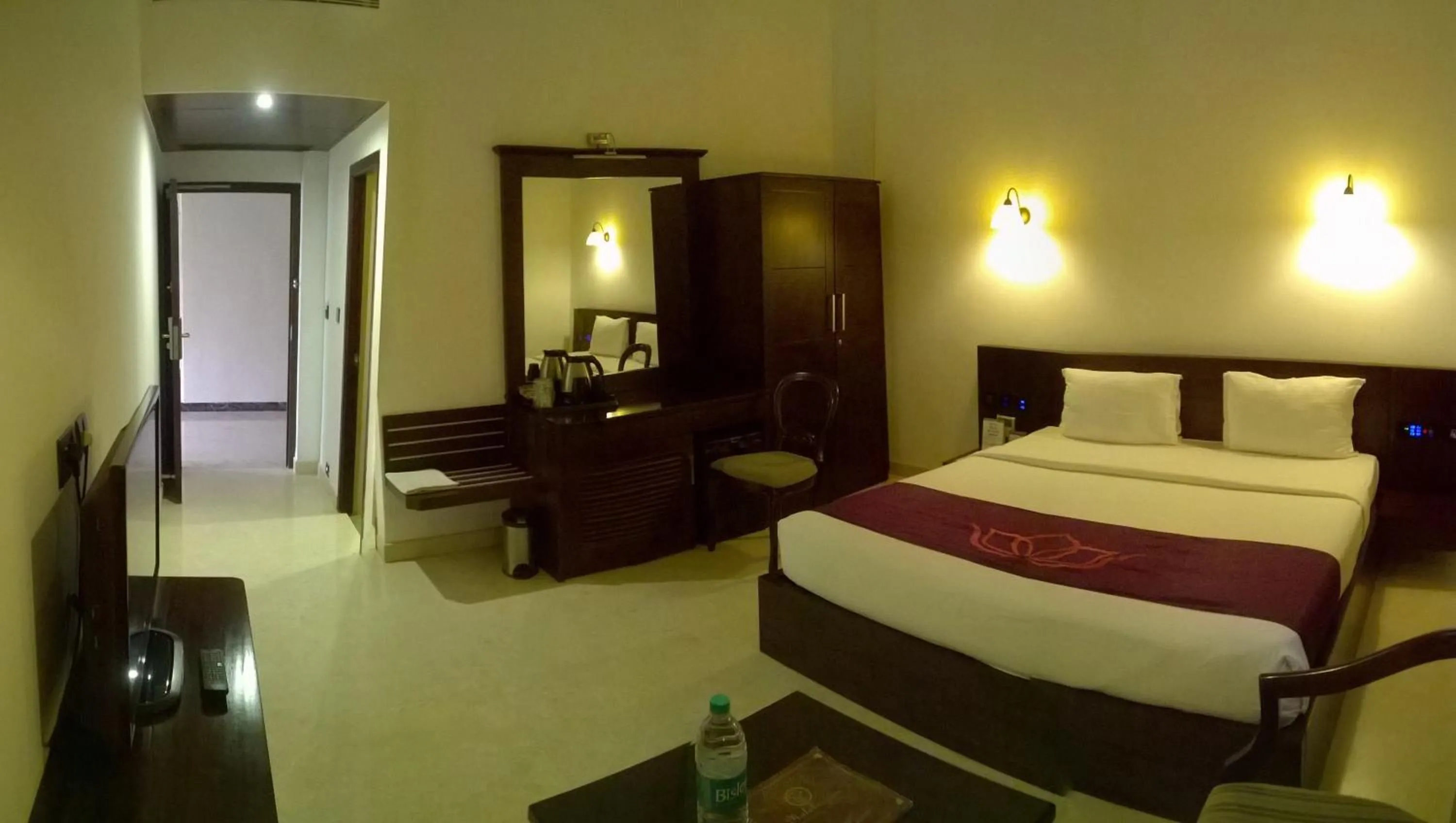 Bedroom in Lakshmi Hotel