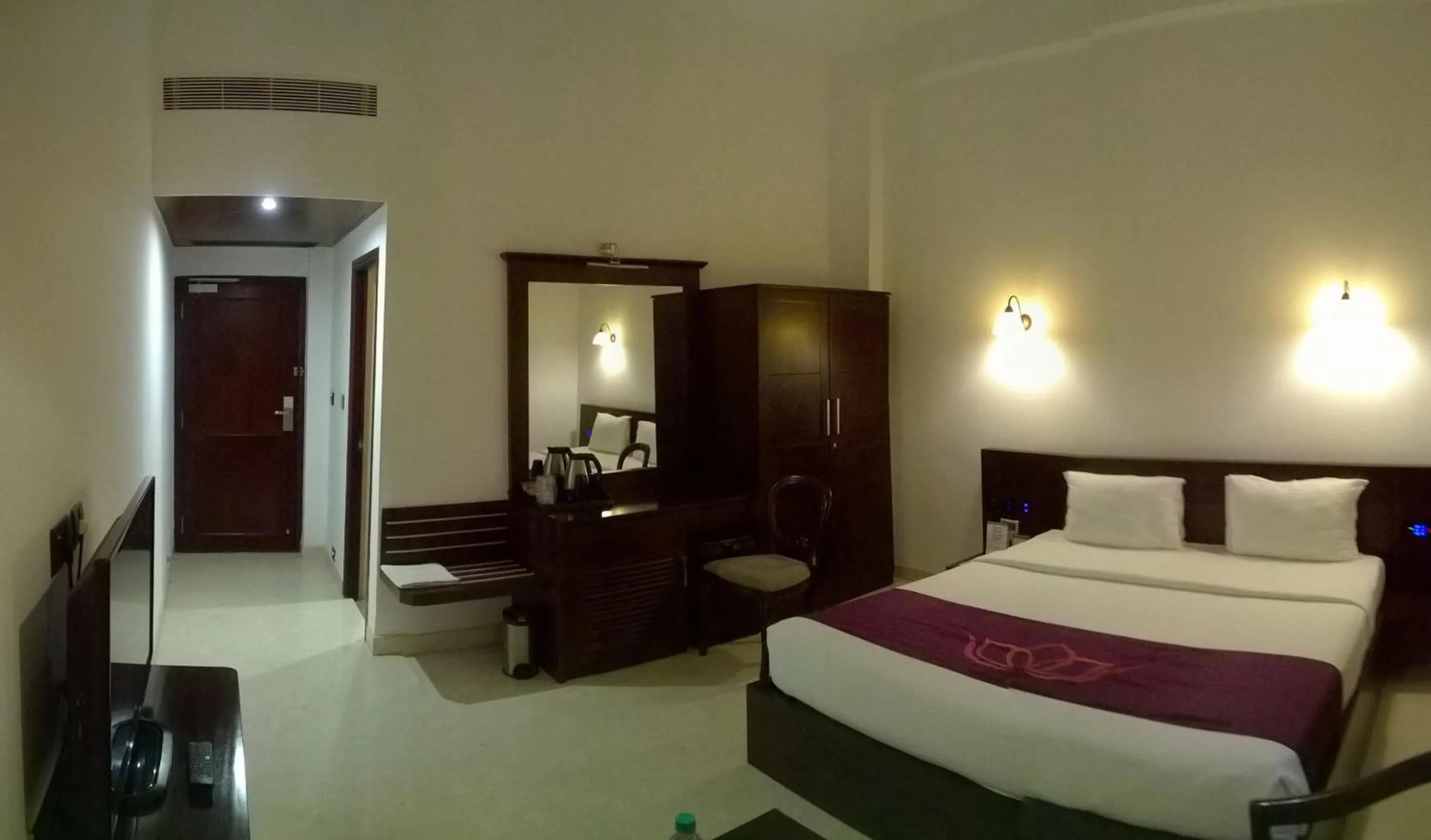 Bedroom in Lakshmi Hotel