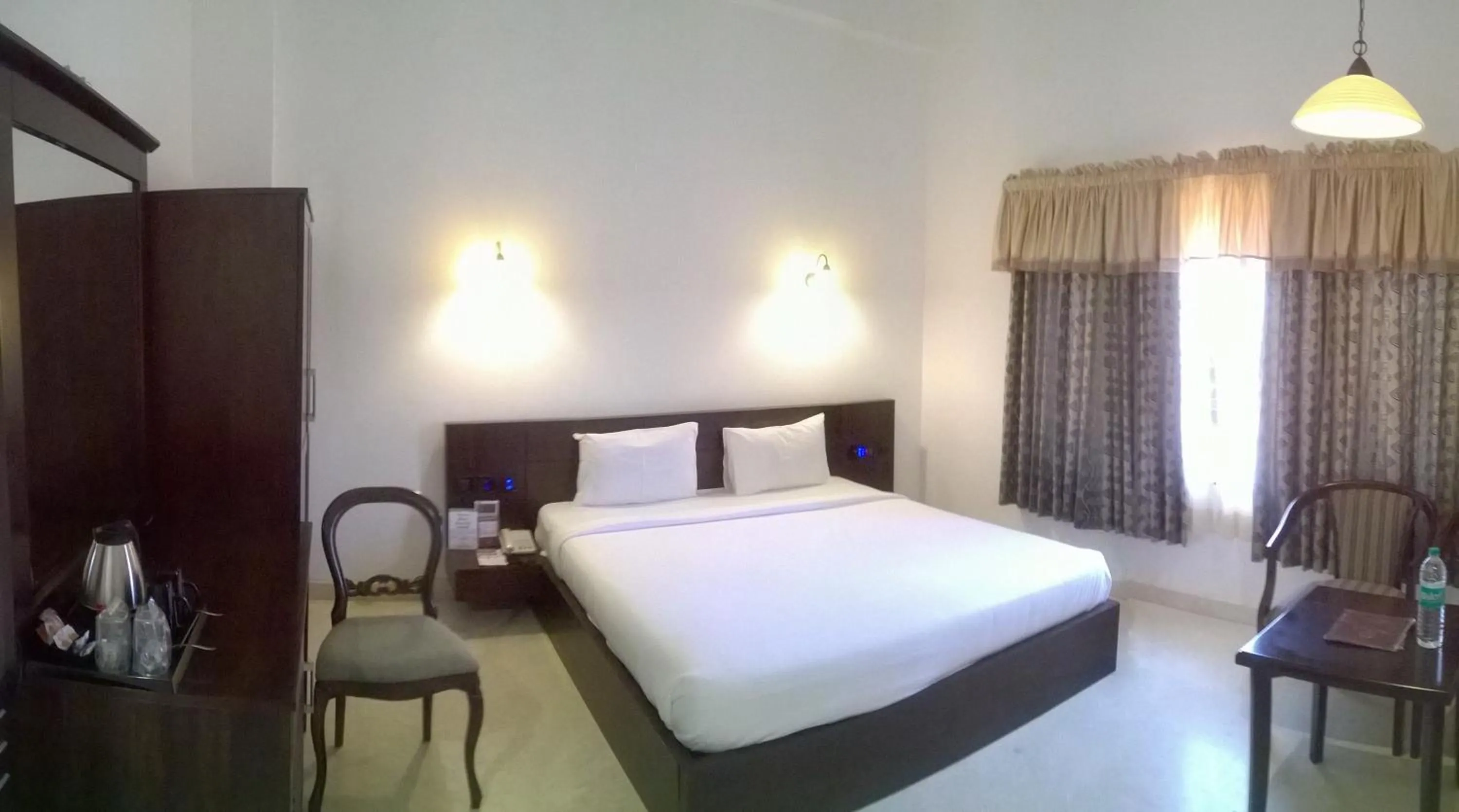 Bedroom in Lakshmi Hotel