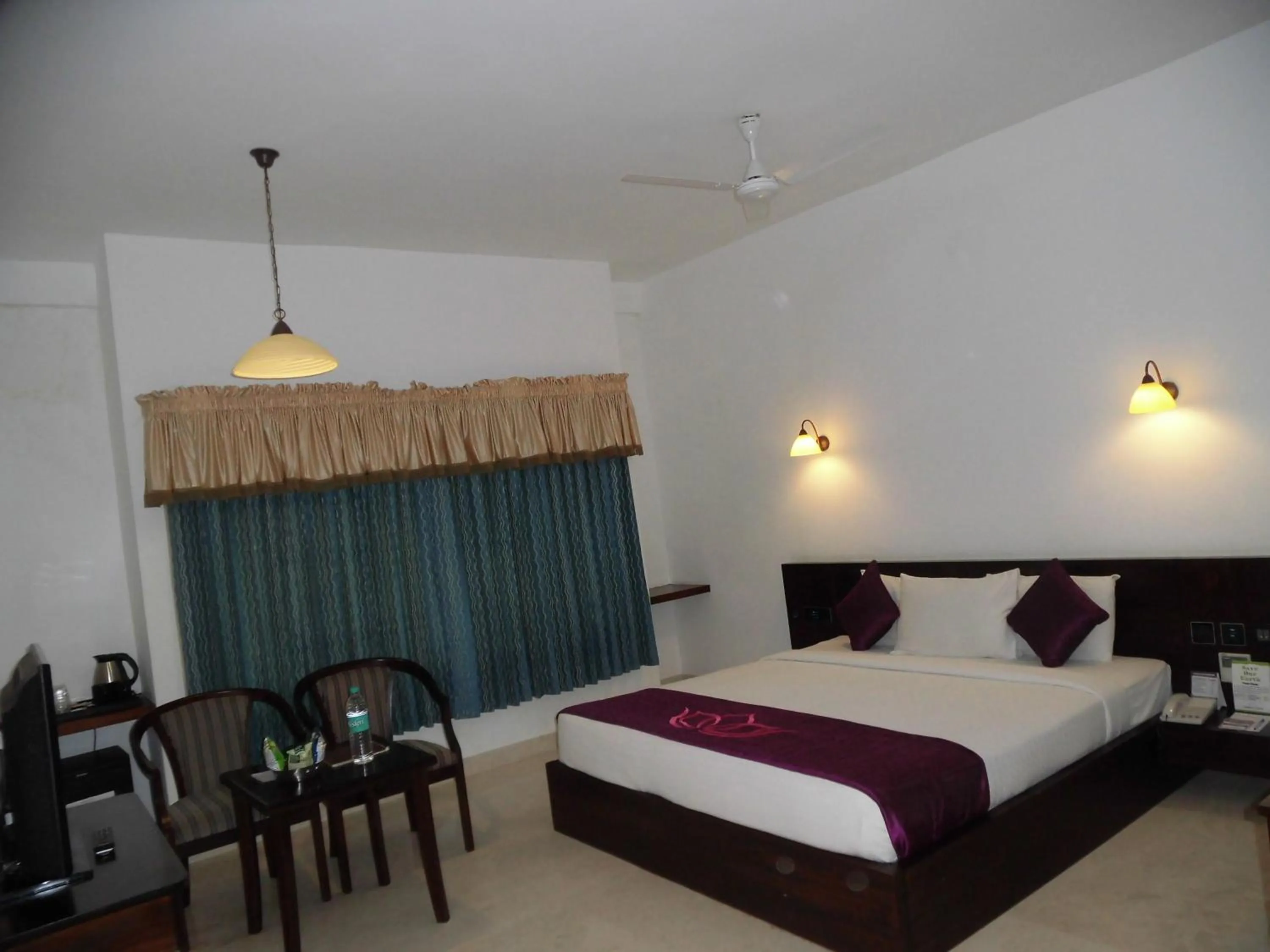 Bedroom in Lakshmi Hotel