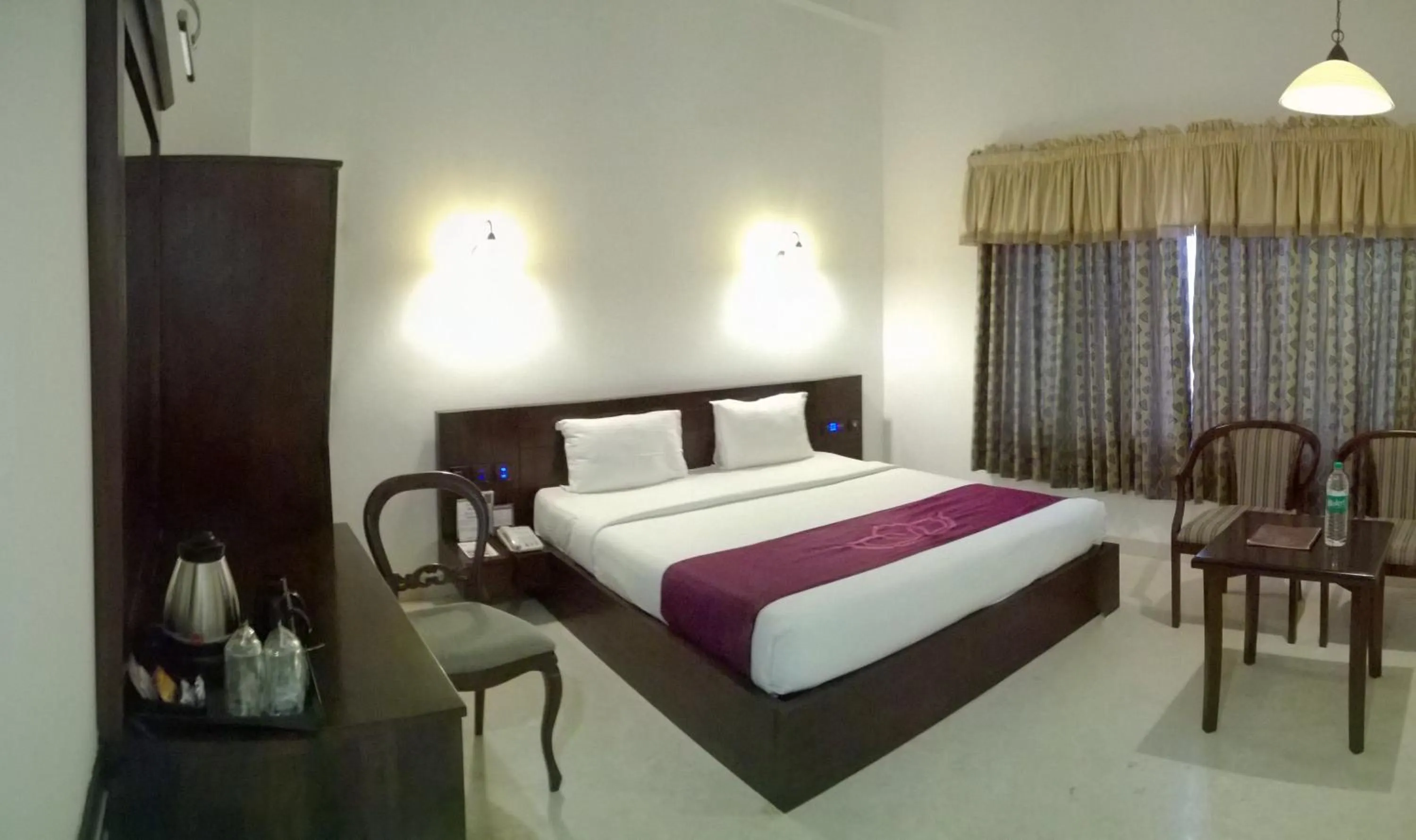Bedroom in Lakshmi Hotel