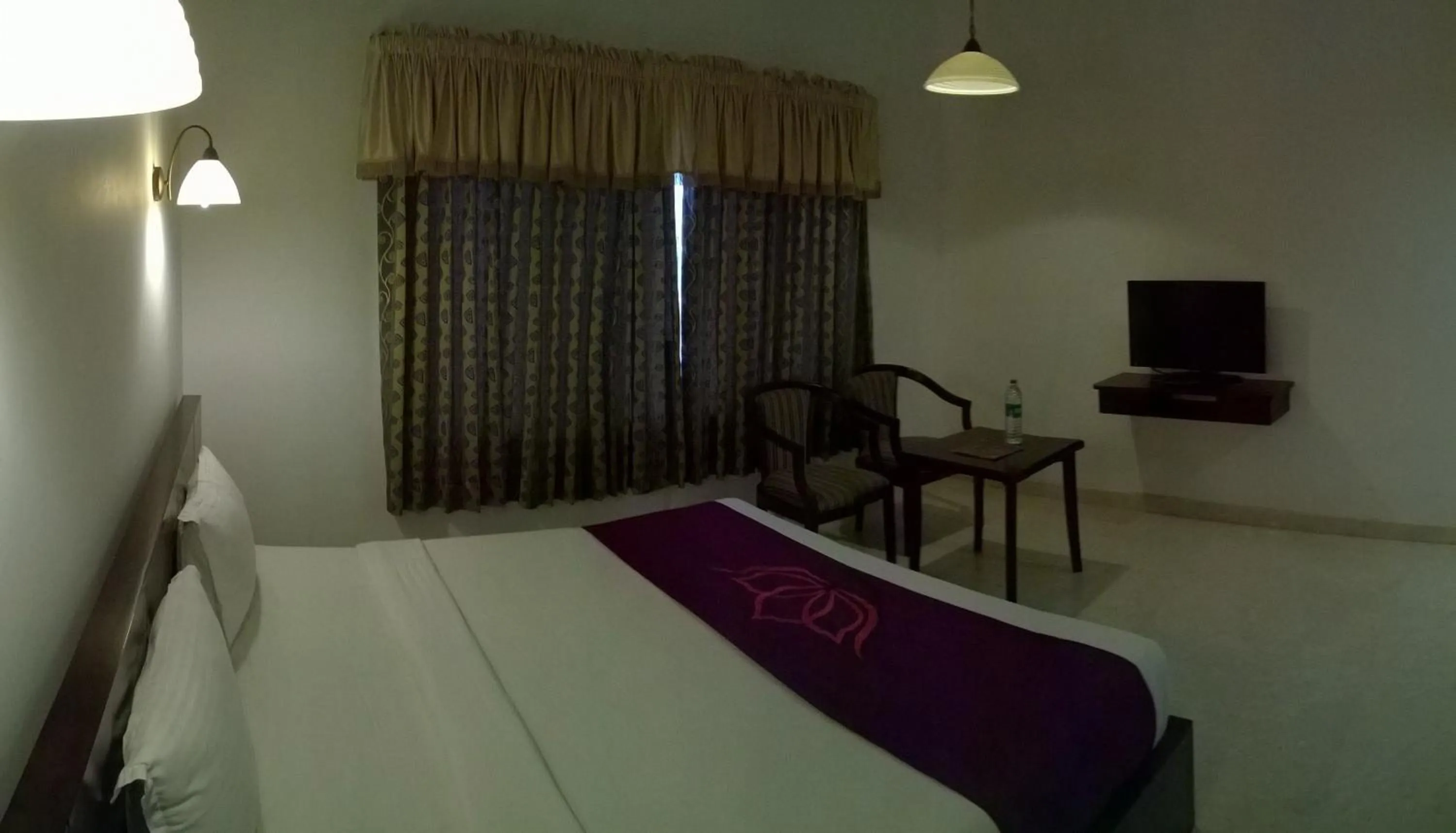 Bedroom in Lakshmi Hotel