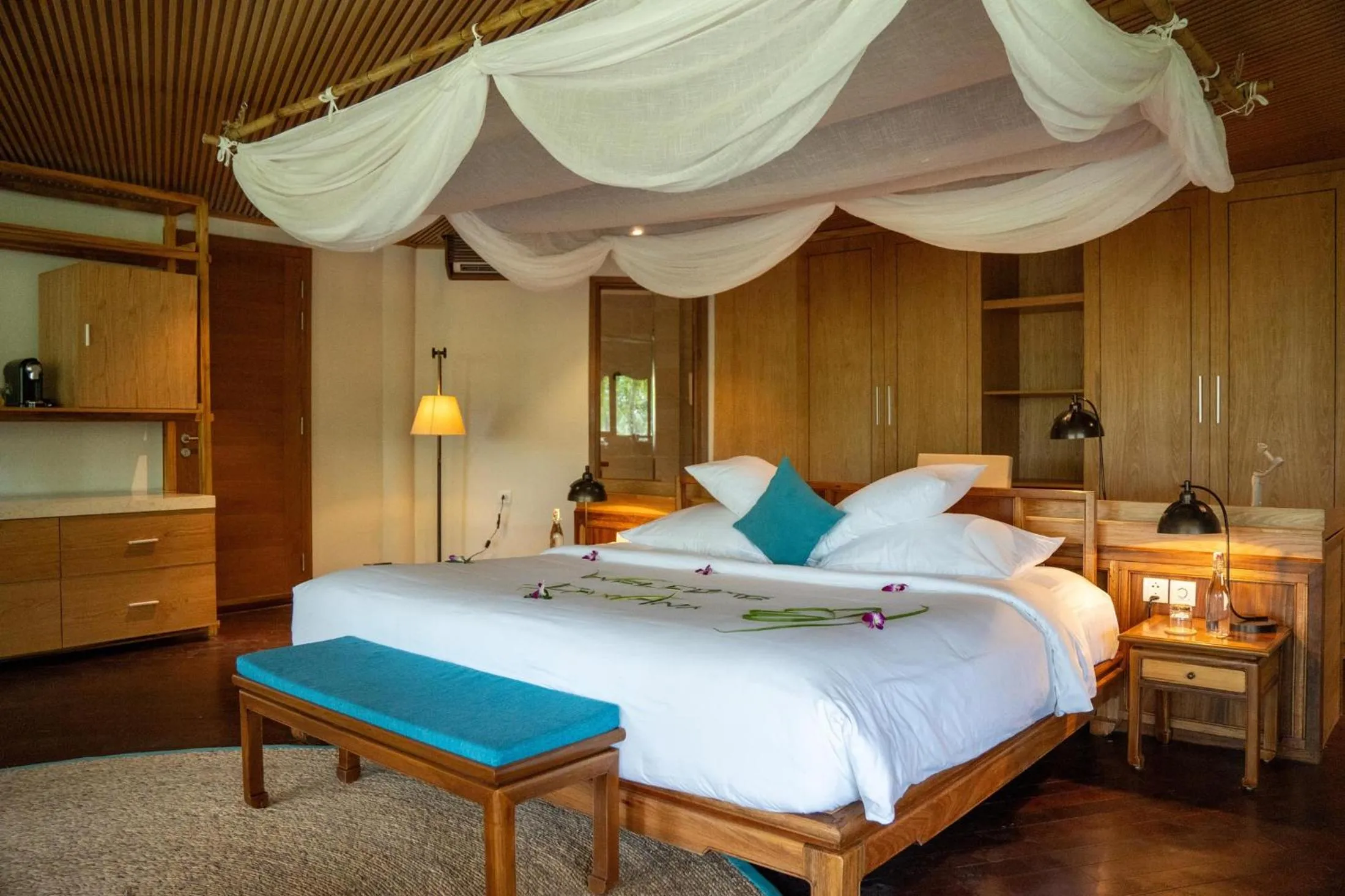 Bed in Pax Ana Doc Let Resort & Spa