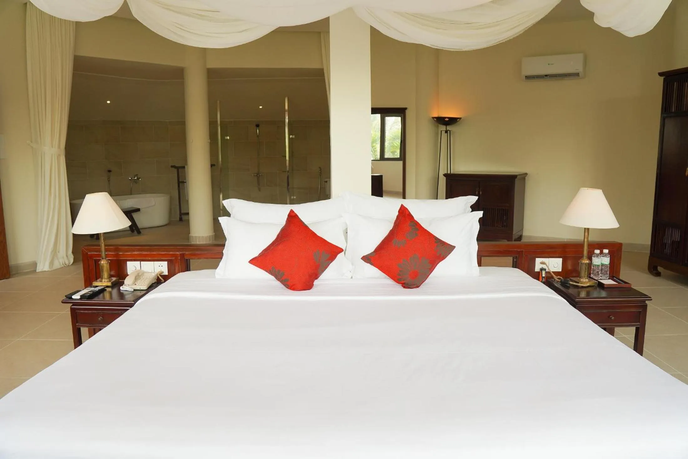 Bed in Pax Ana Doc Let Resort & Spa