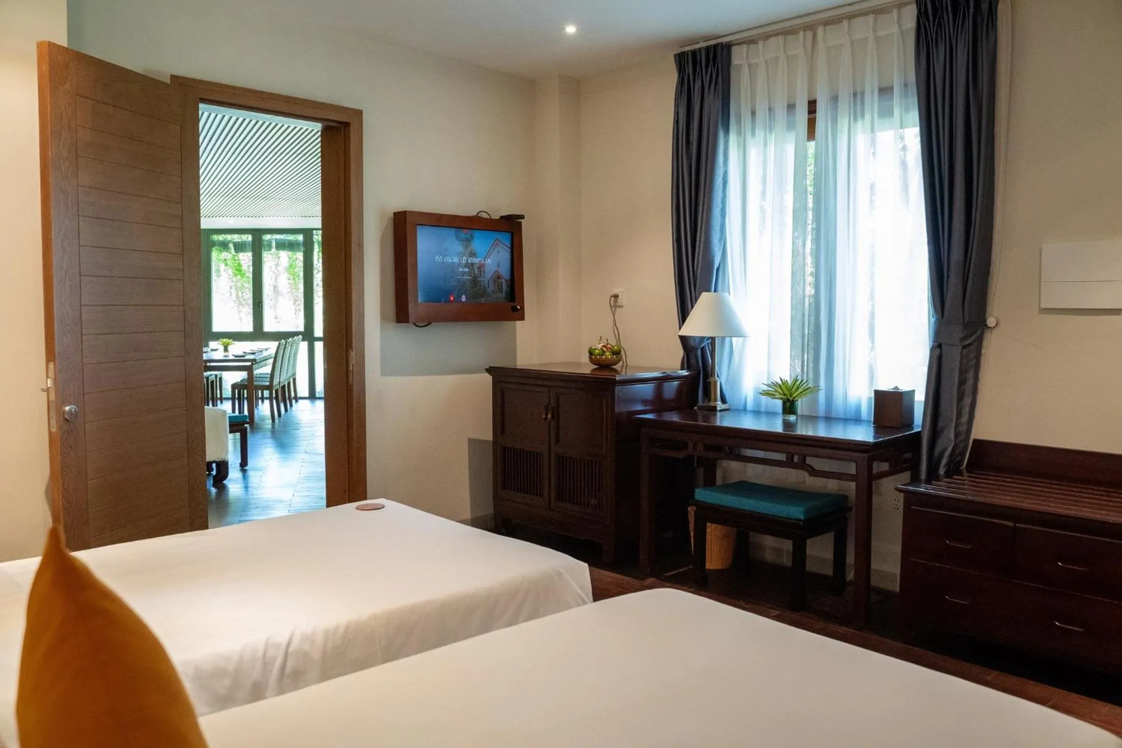 Bed in Pax Ana Doc Let Resort & Spa