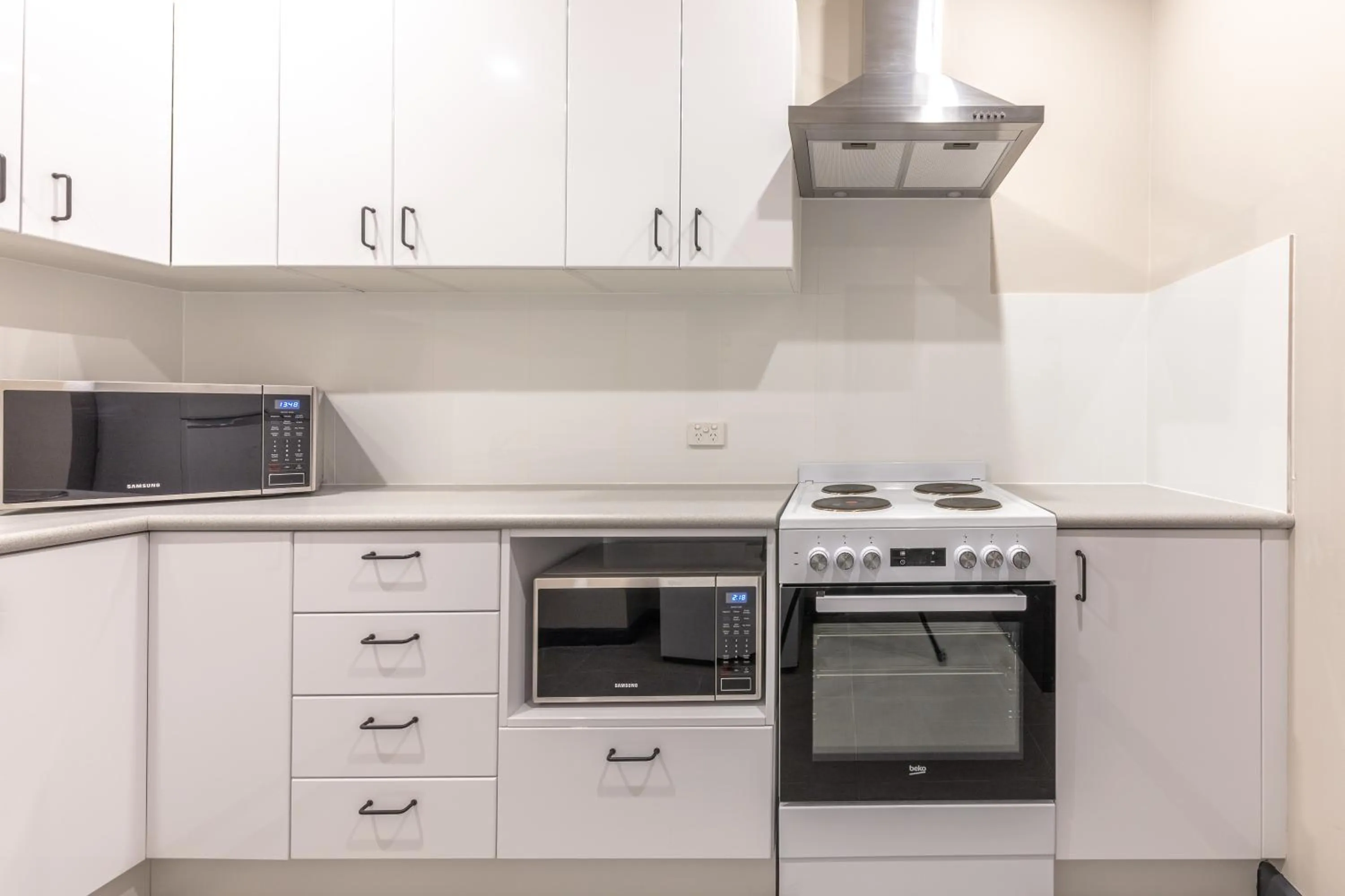 Communal kitchen in Lakemba Hotel