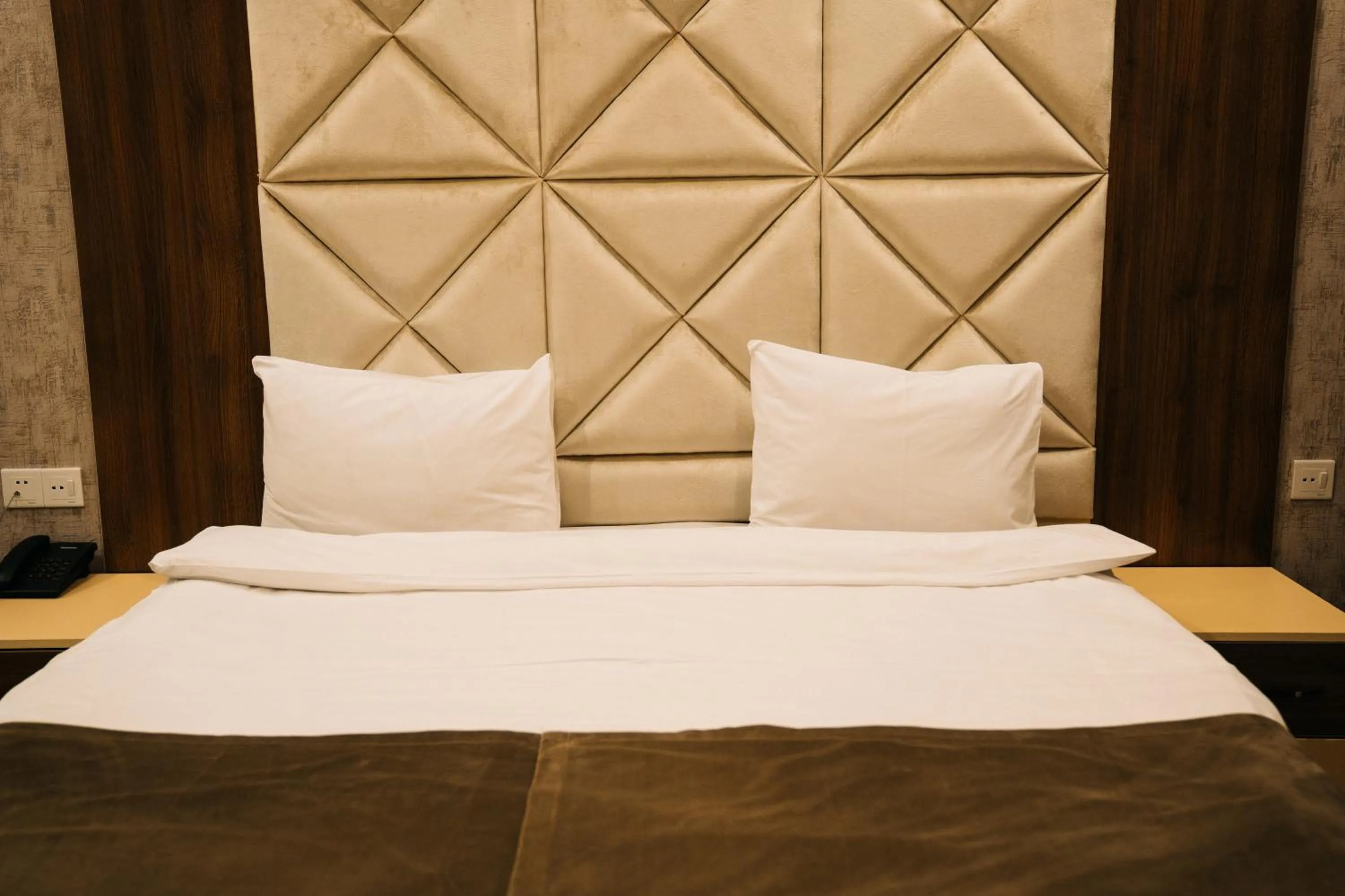 Bed in The Clocktower Hotel