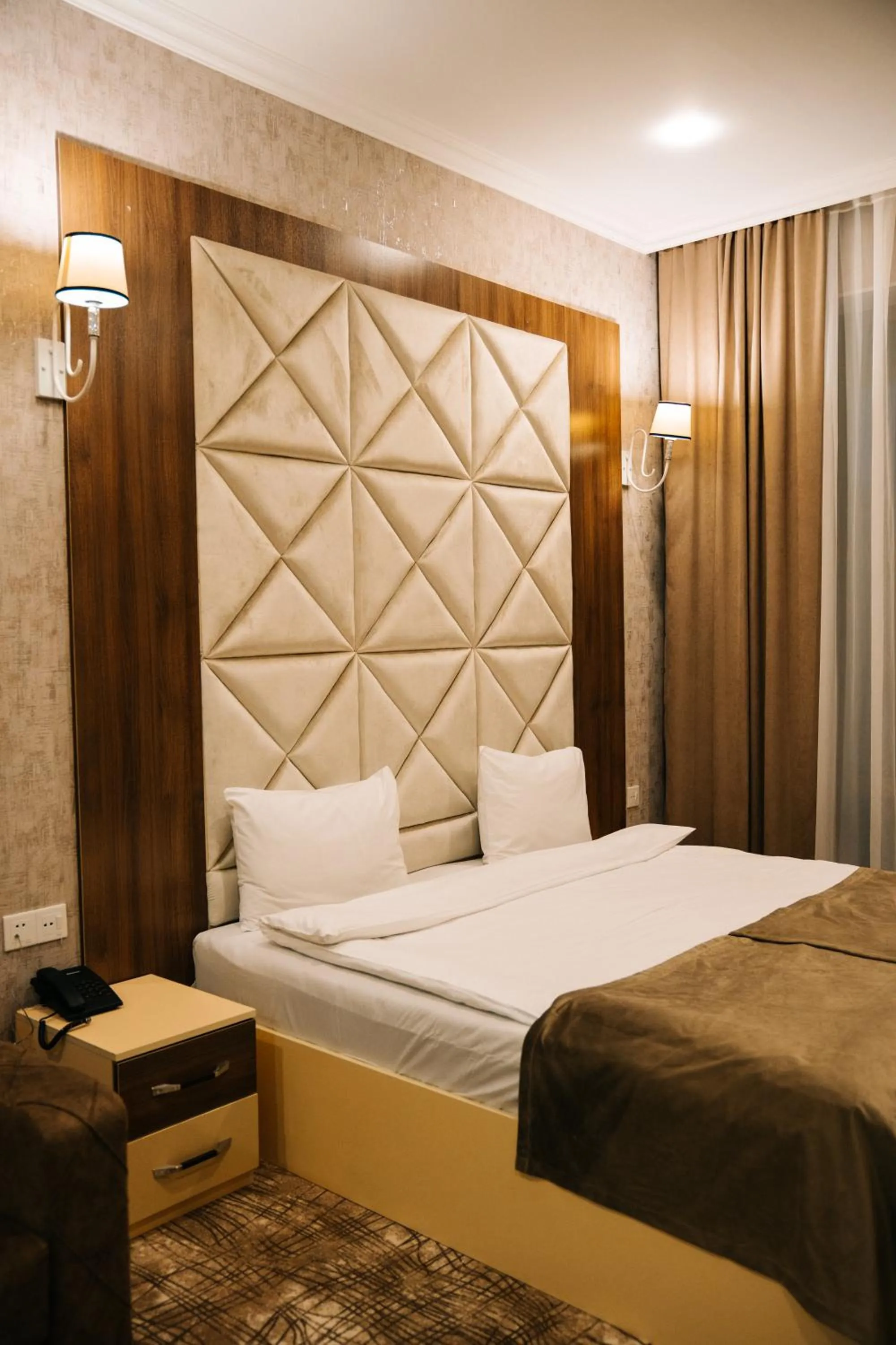 Bed in The Clocktower Hotel