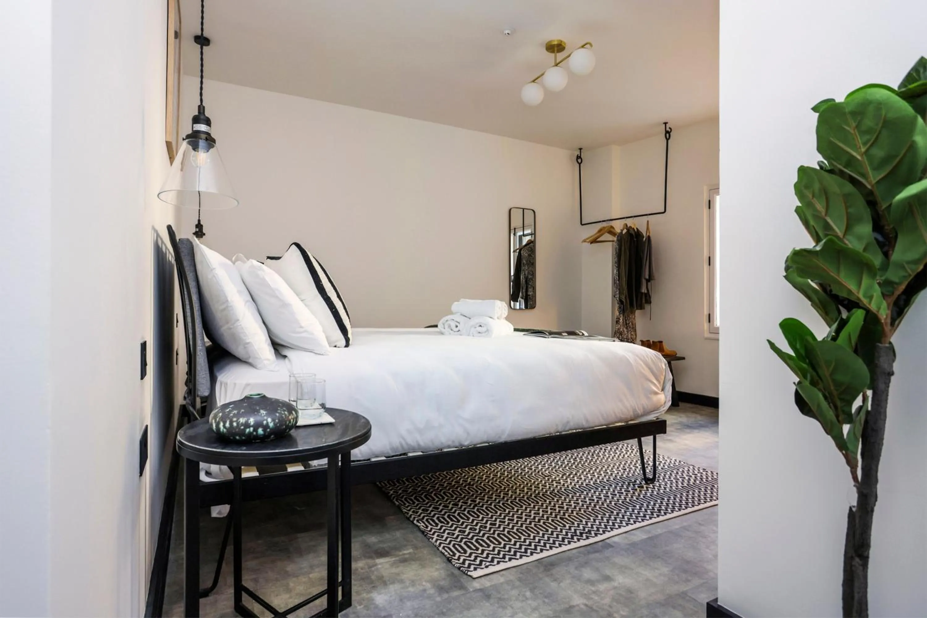 Bed in The Brewers Rooms Contemporary Aparthotel