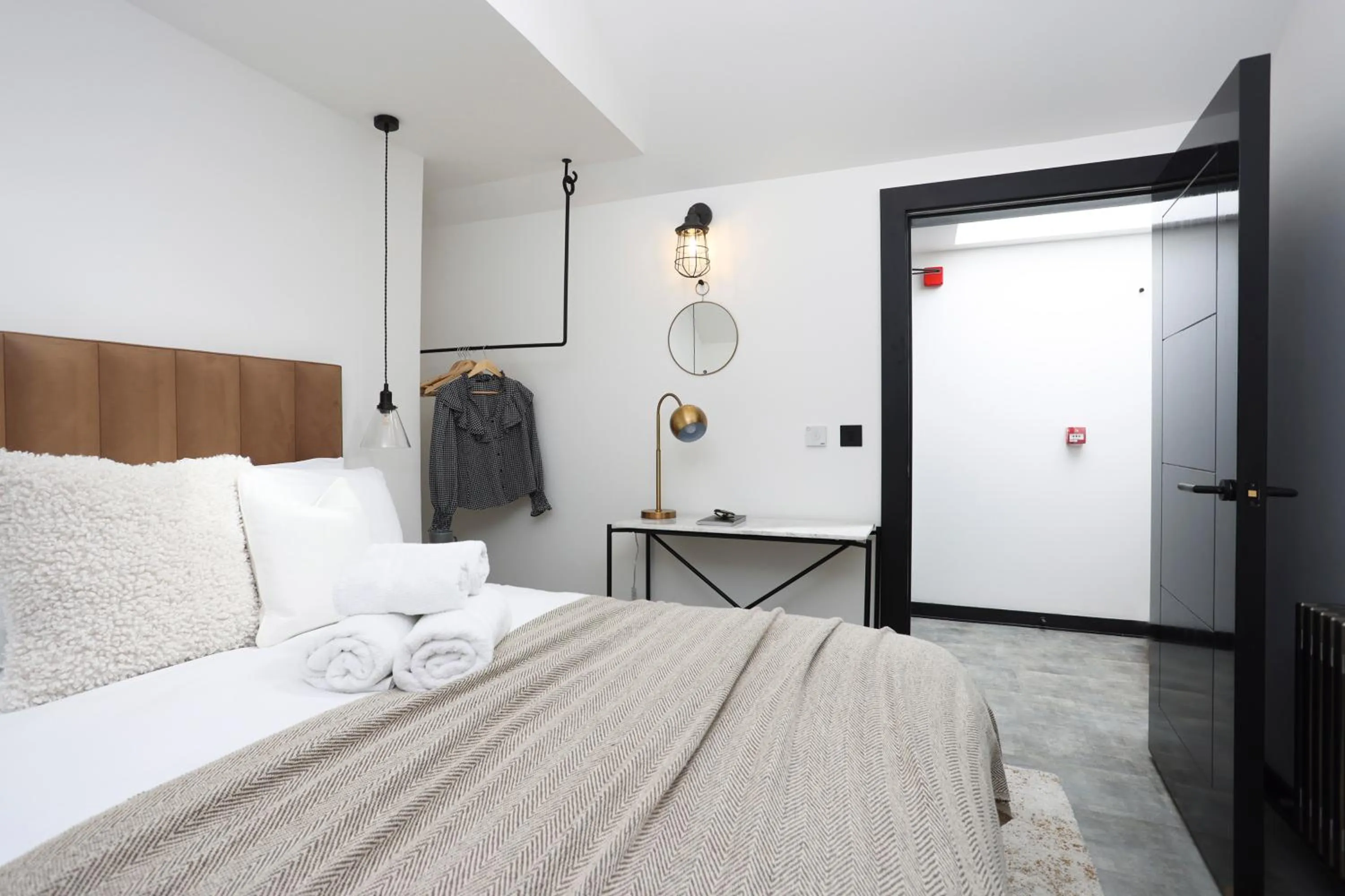 Bed in The Brewers Rooms Contemporary Aparthotel