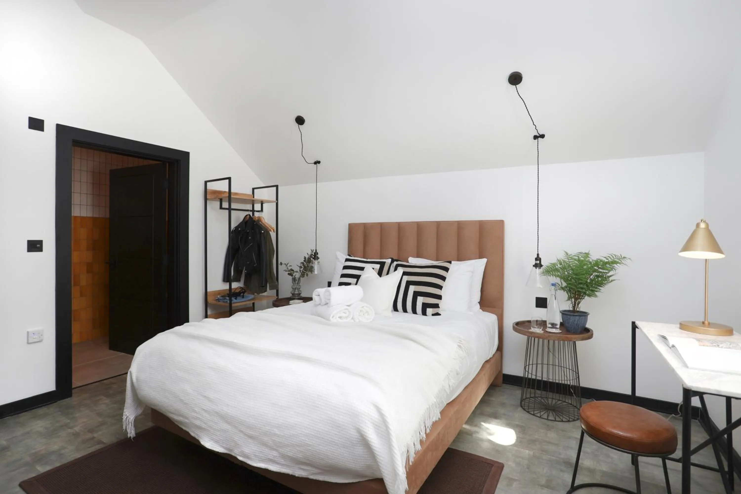 Bed in The Brewers Rooms Contemporary Aparthotel