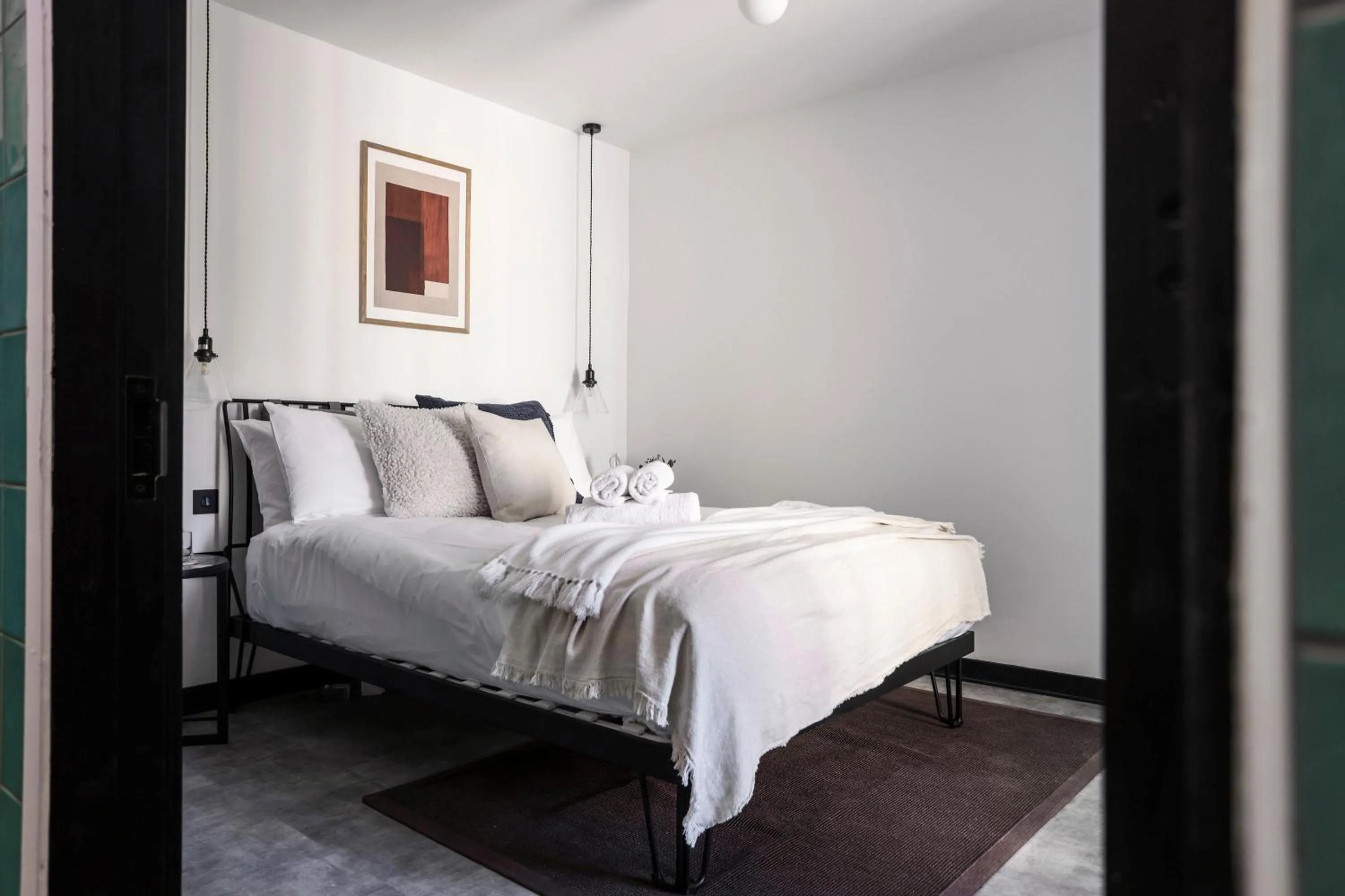 Bed in The Brewers Rooms Contemporary Aparthotel