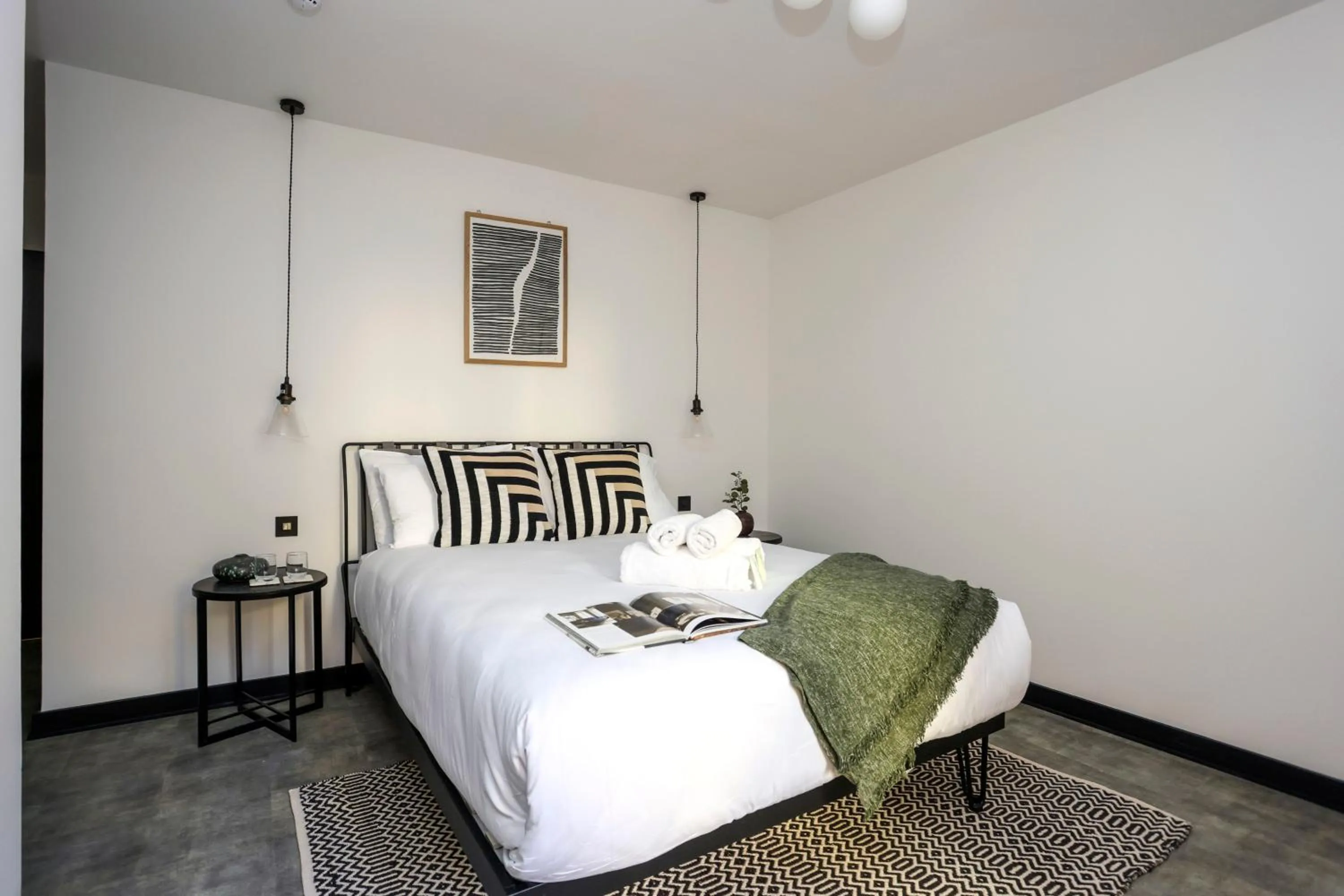 Bed in The Brewers Rooms Contemporary Aparthotel