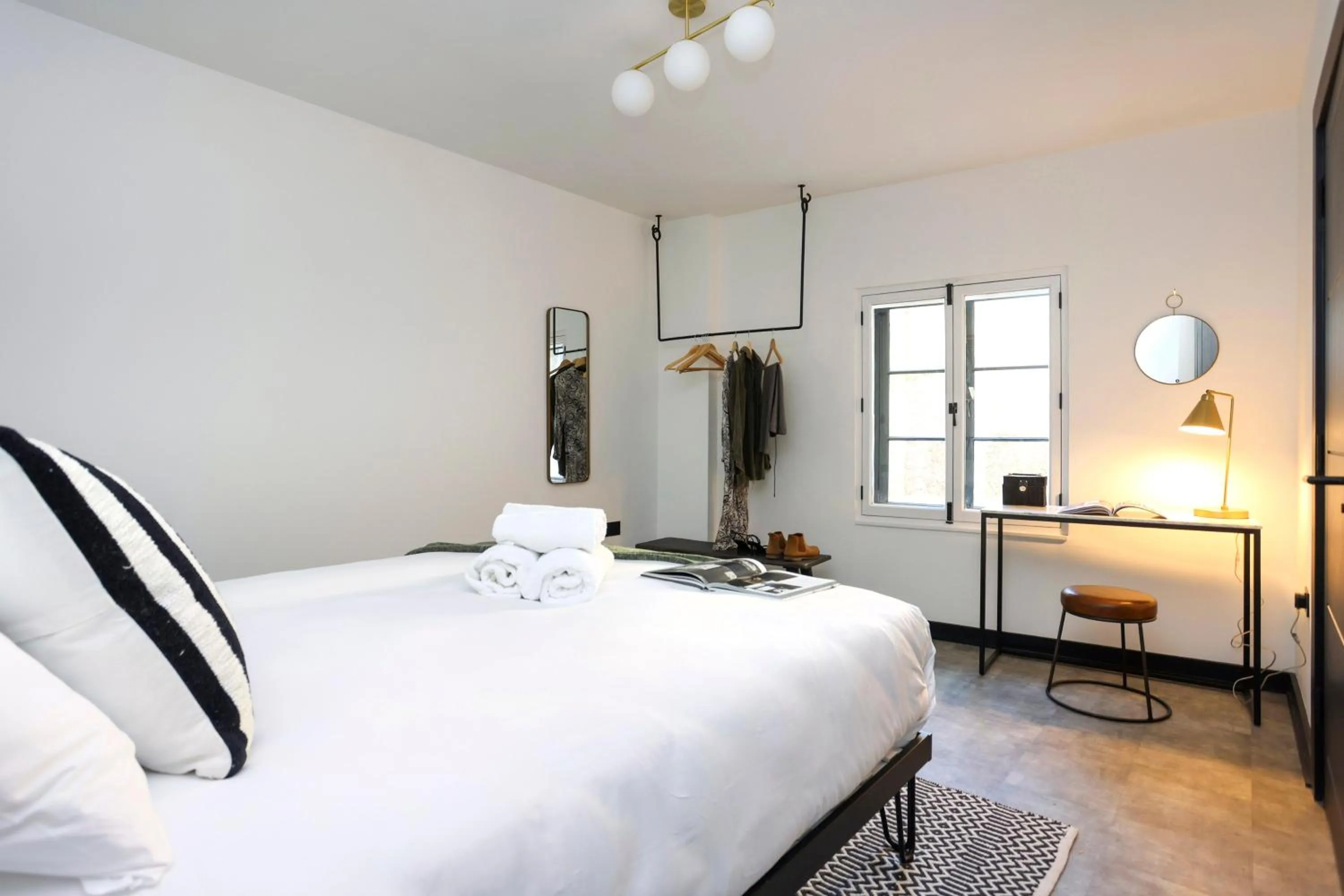 Bed in The Brewers Rooms Contemporary Aparthotel