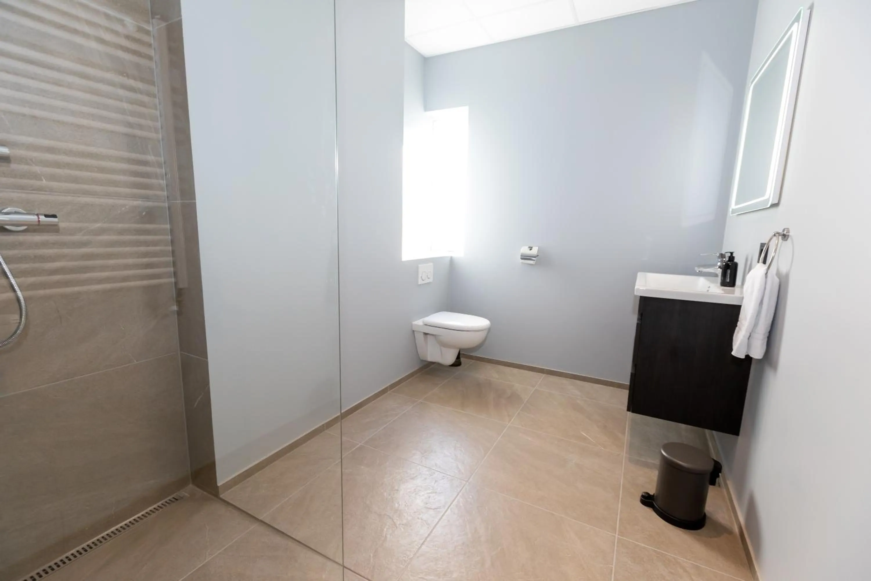 Bathroom in Akureyri Lux Apartments with hot tub access