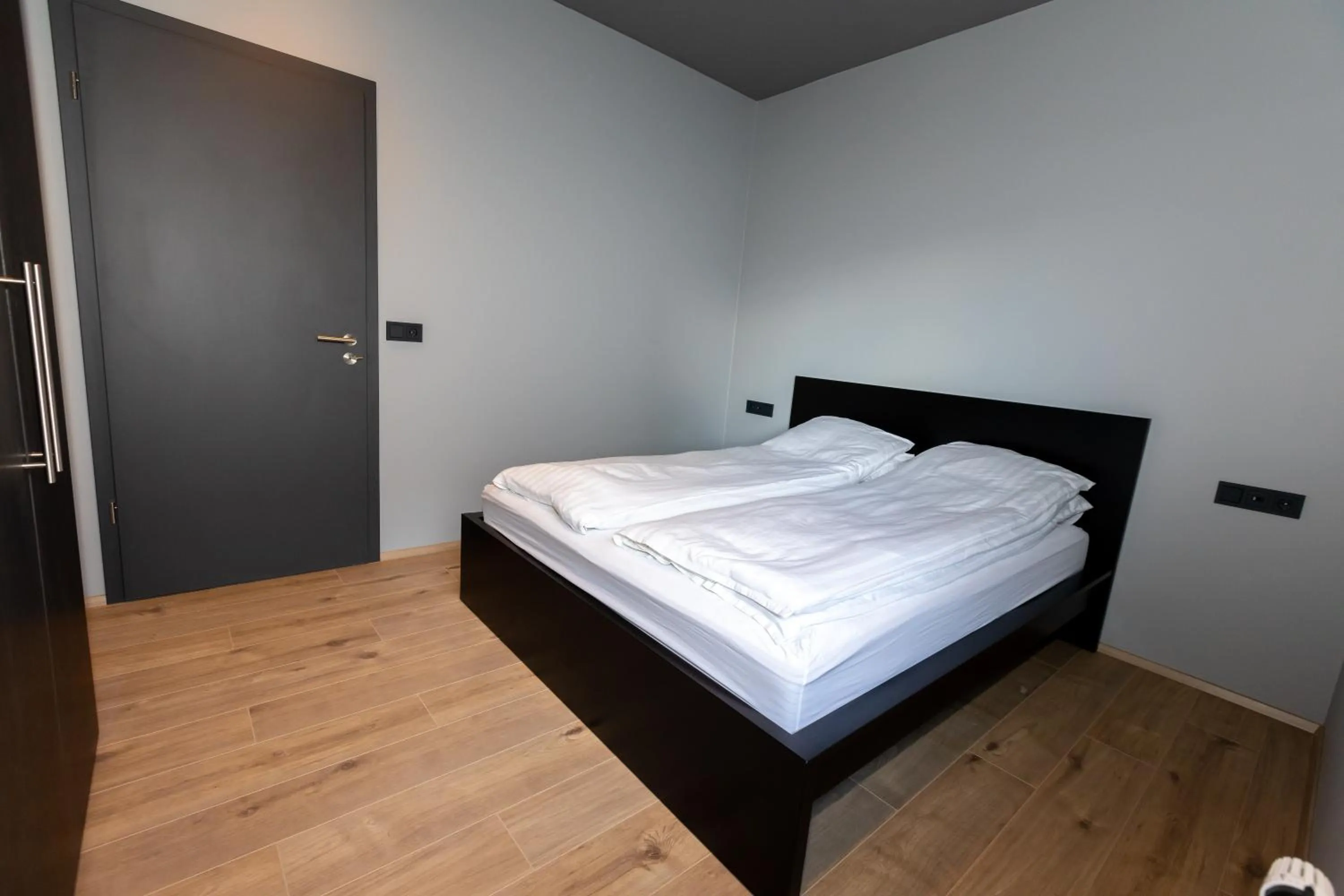 Bedroom, Bed in Akureyri Lux Apartments with hot tub access