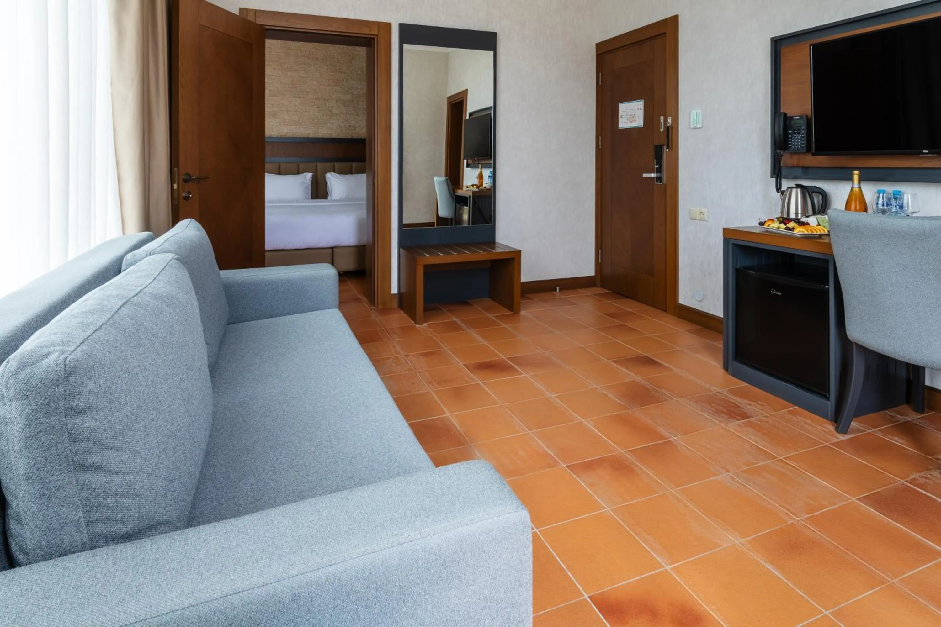 Communal lounge/ TV room in Hotel Chateau Kvirike