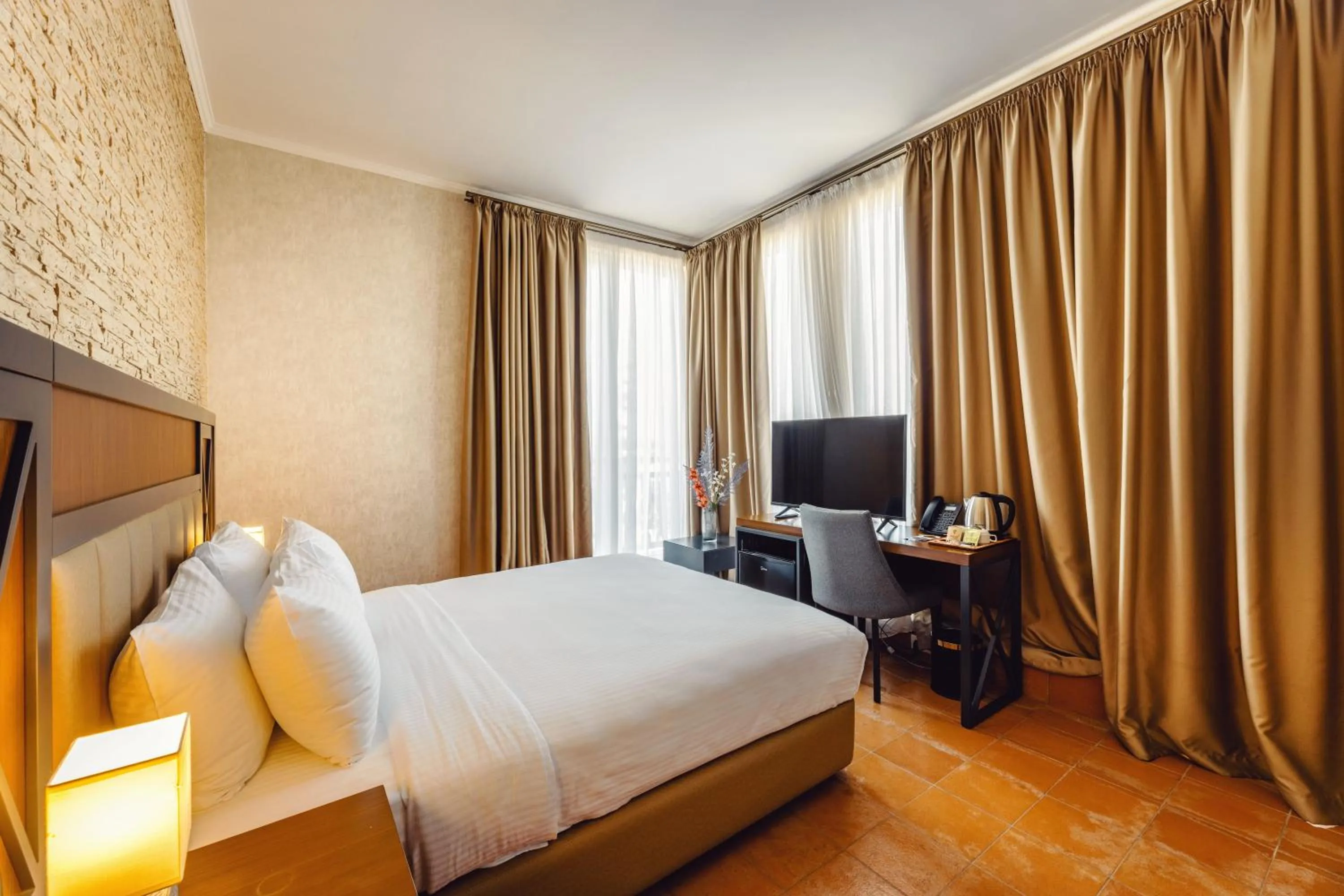 Bed in Hotel Chateau Kvirike