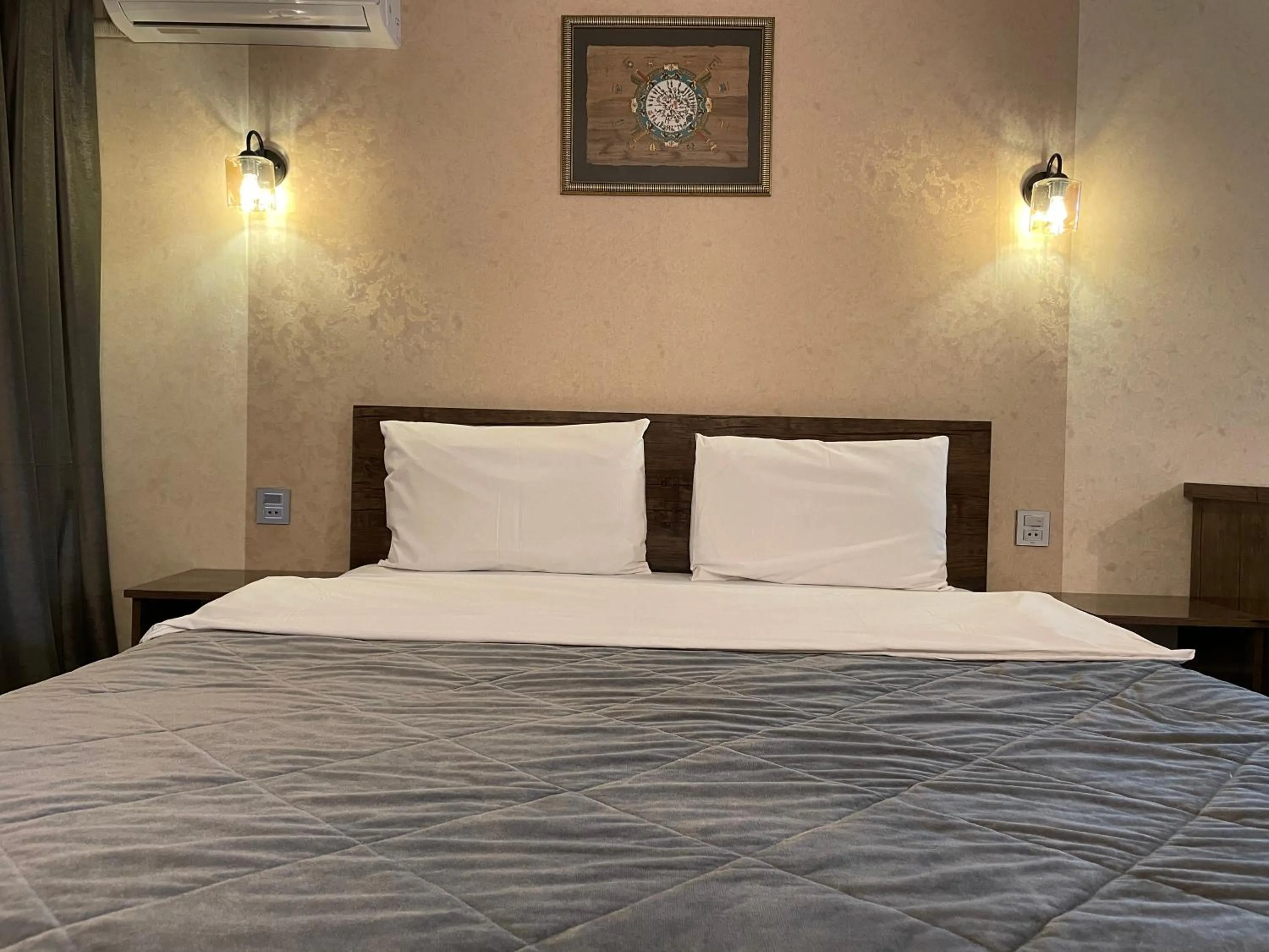 Bed in Moss Art Boutique Hotel