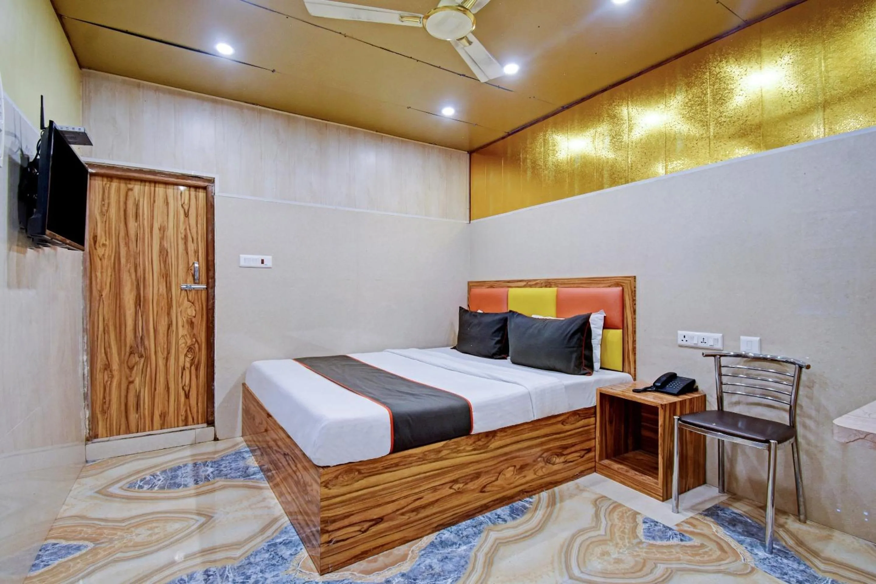 Bedroom, Bed in Hotel O Shree Krishna International