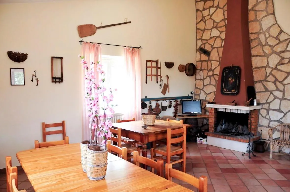 Communal lounge/ TV room in La Masseria di Villa Giulia