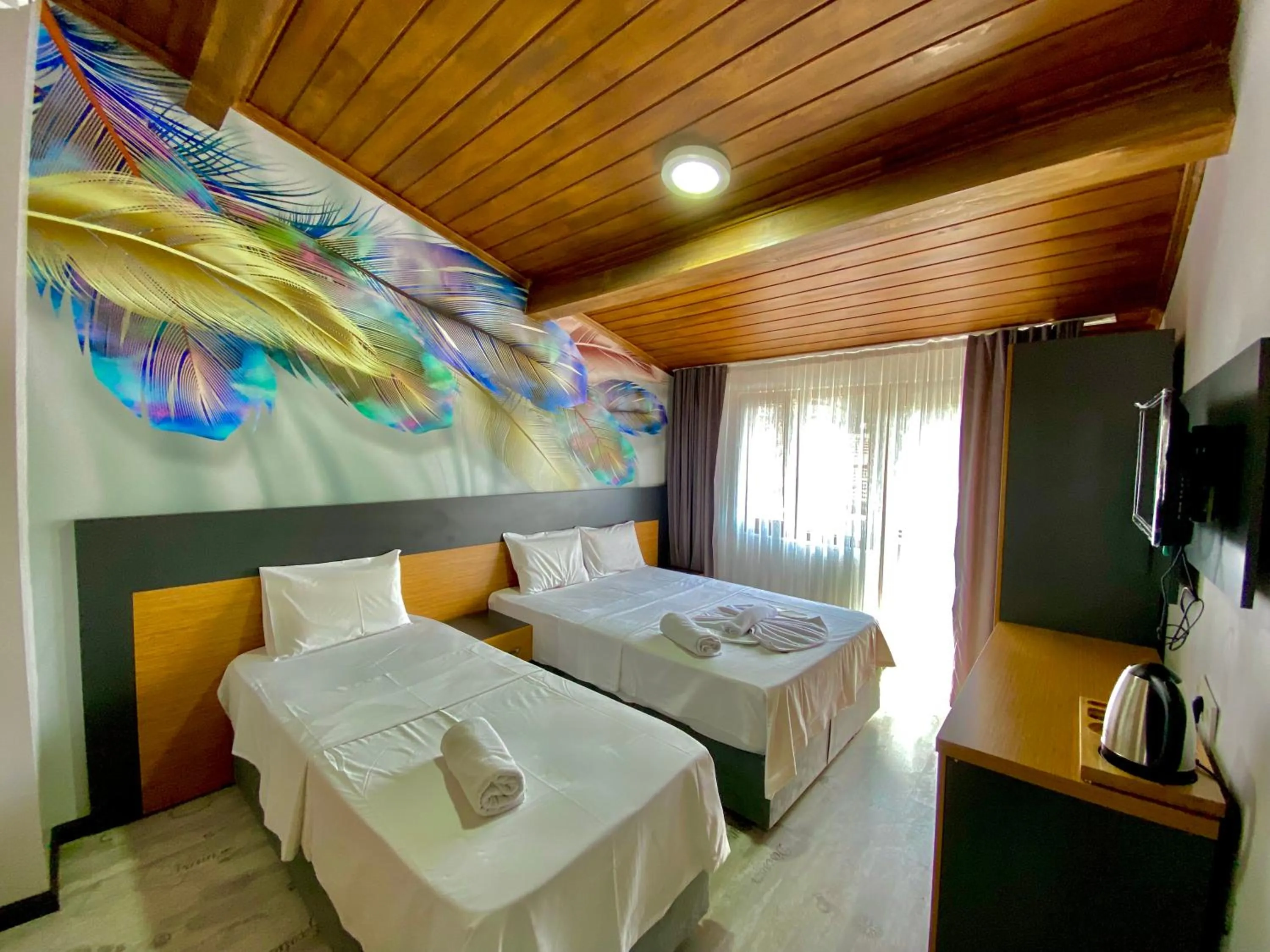 Bed in Victorious Hotel