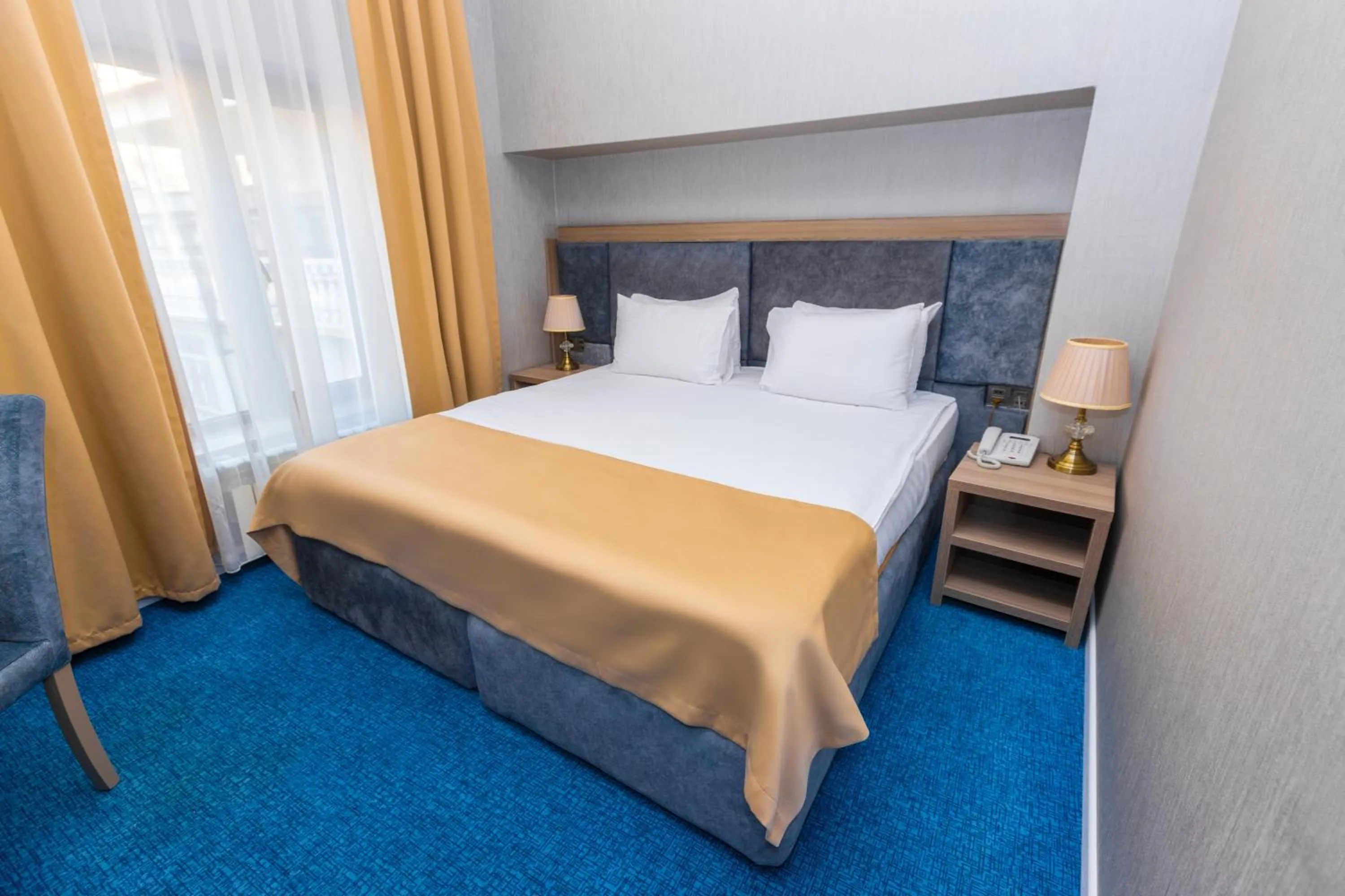 Bedroom, Bed in Grand Midway Hotel