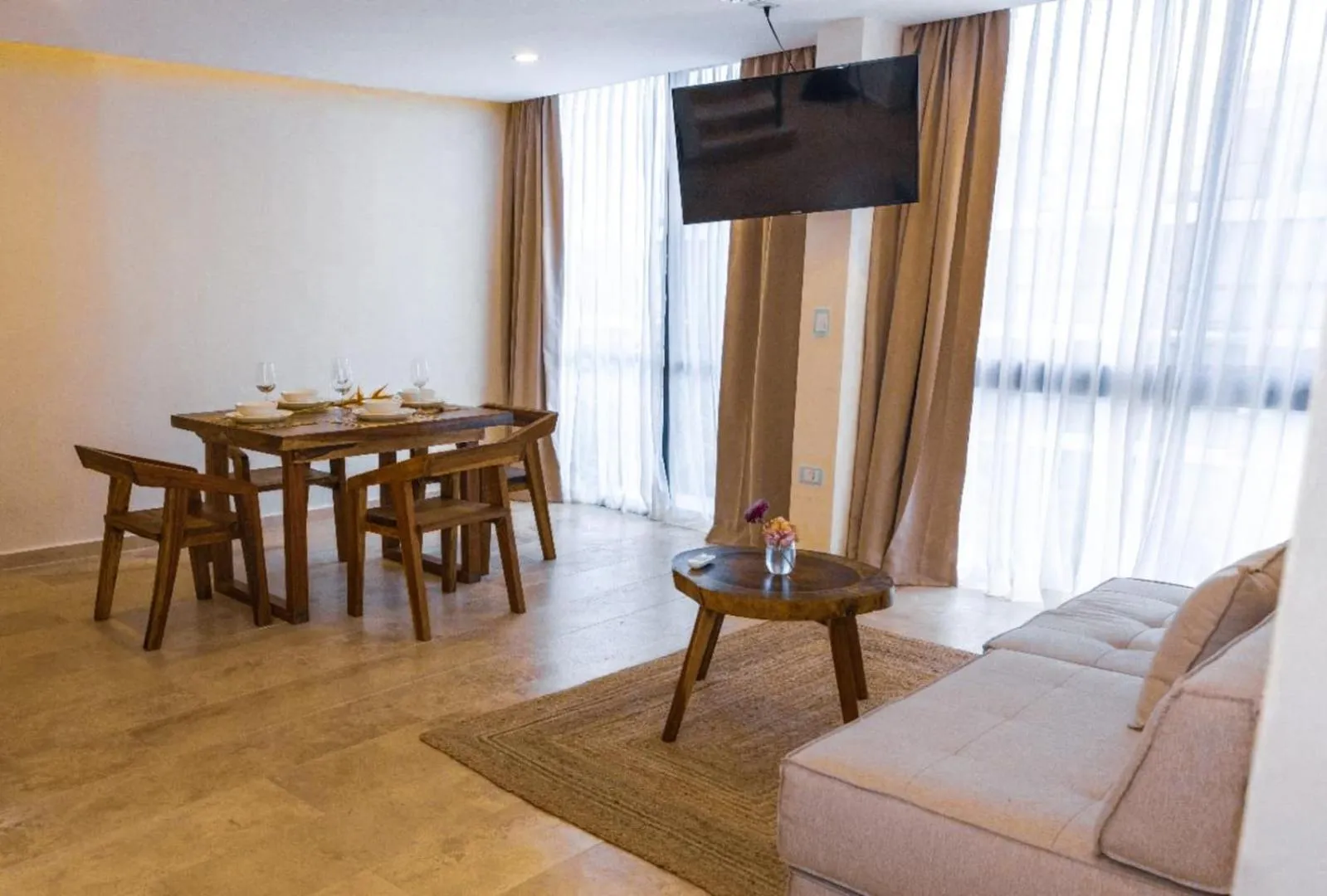 Living room in The Waves Tulum by BNB Experience