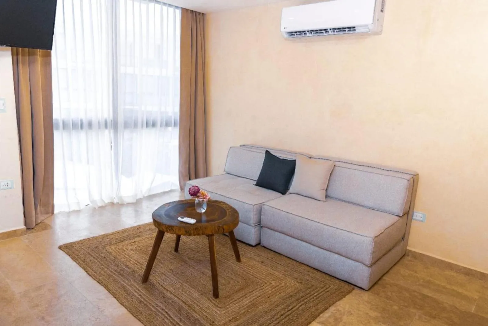 Living room in The Waves Tulum by BNB Experience