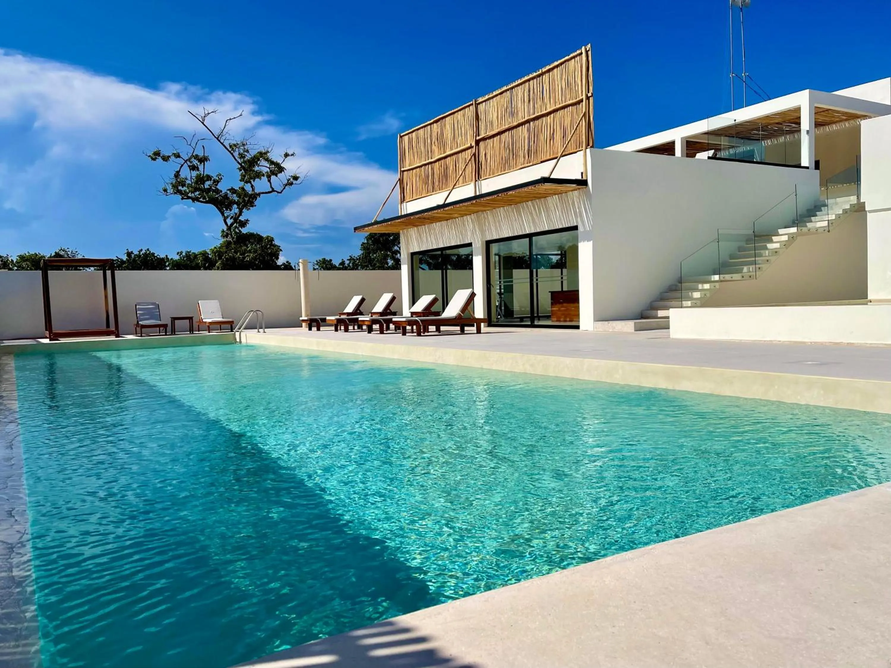 Swimming pool in The Waves Tulum by BNB Experience