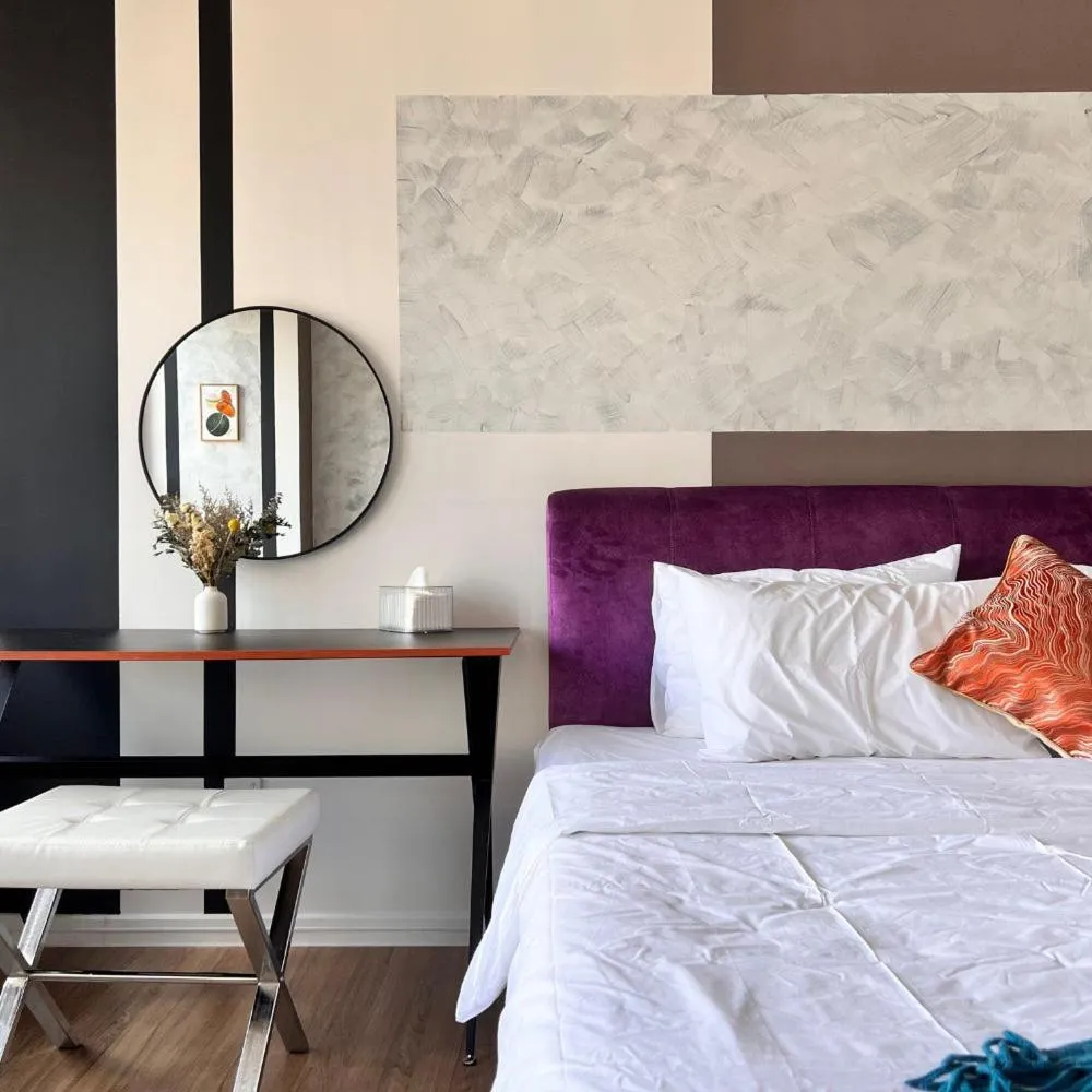 Bed in Ceylonz Suites by Living Signature