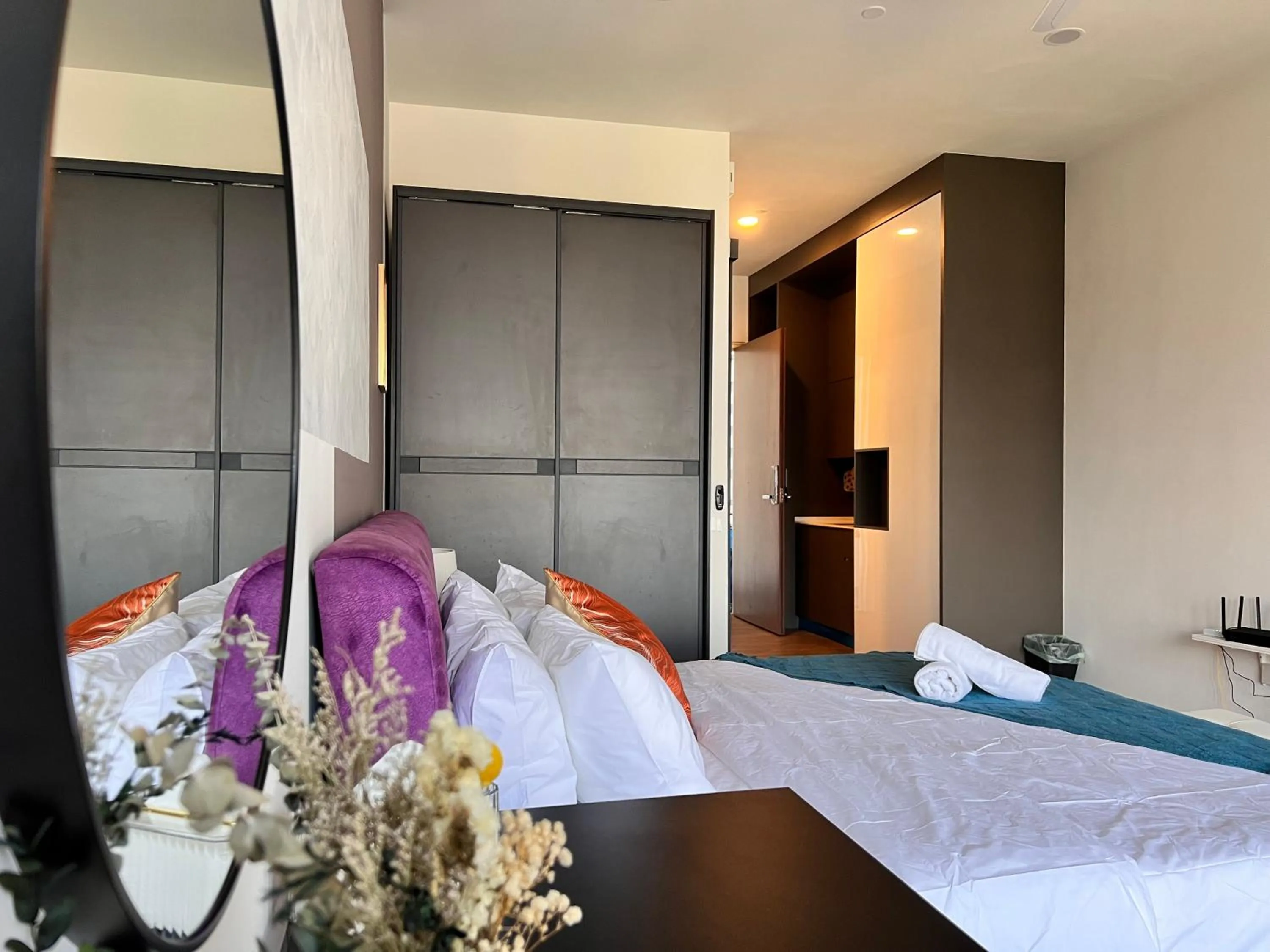 Bed in Ceylonz Suites by Living Signature