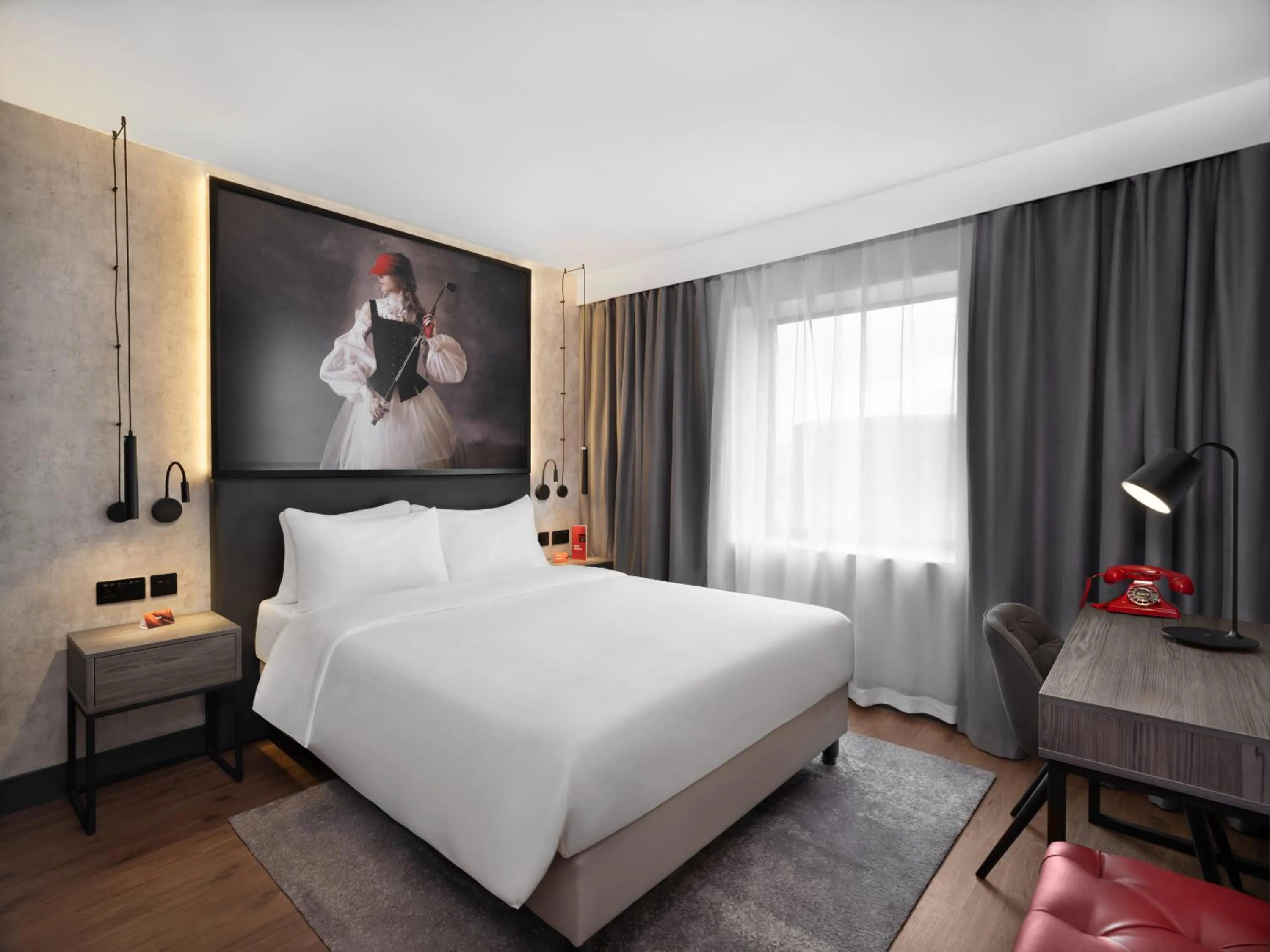 Bed in Radisson RED London Gatwick Airport