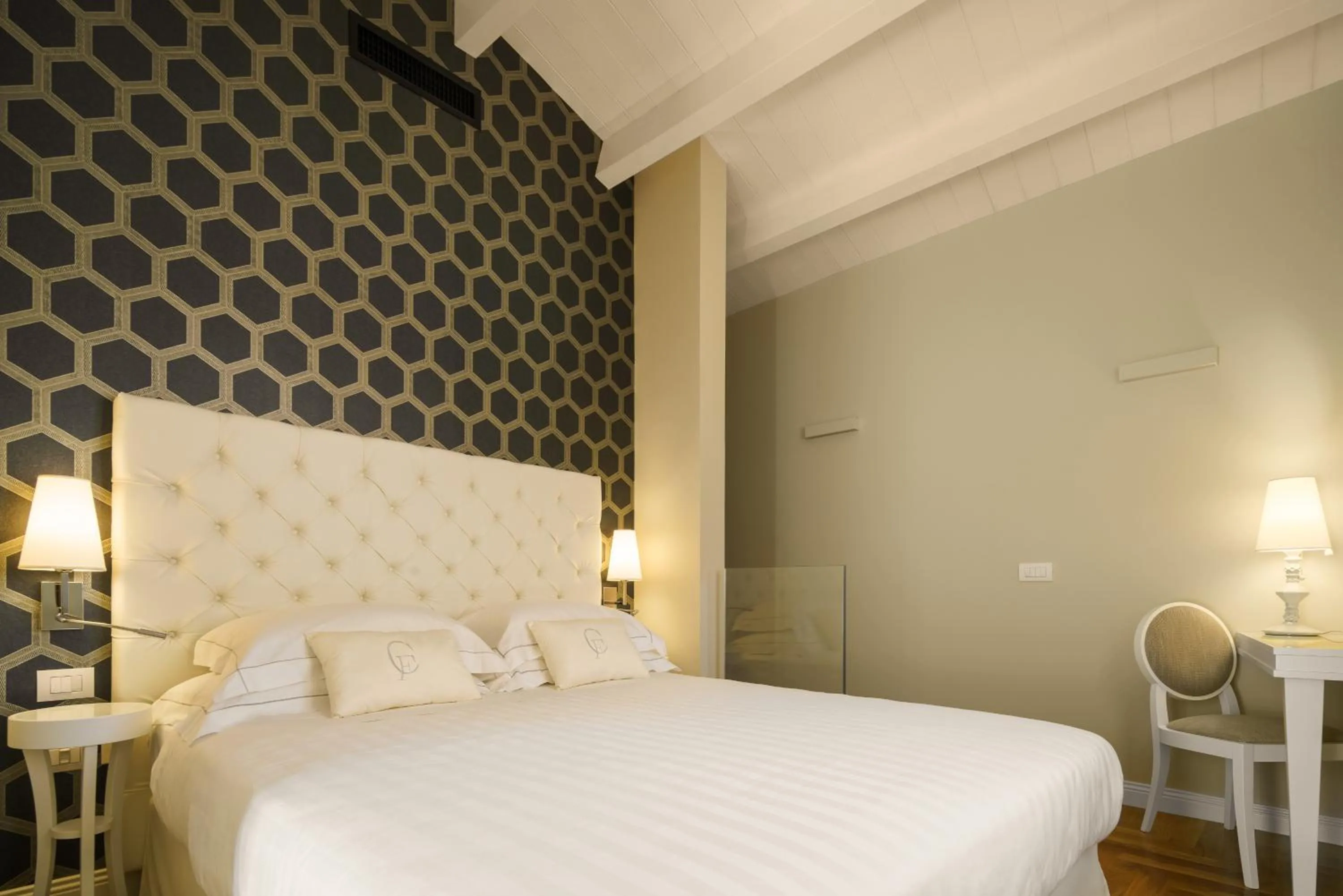 Bed in Boutique Hotel Carlo Felice