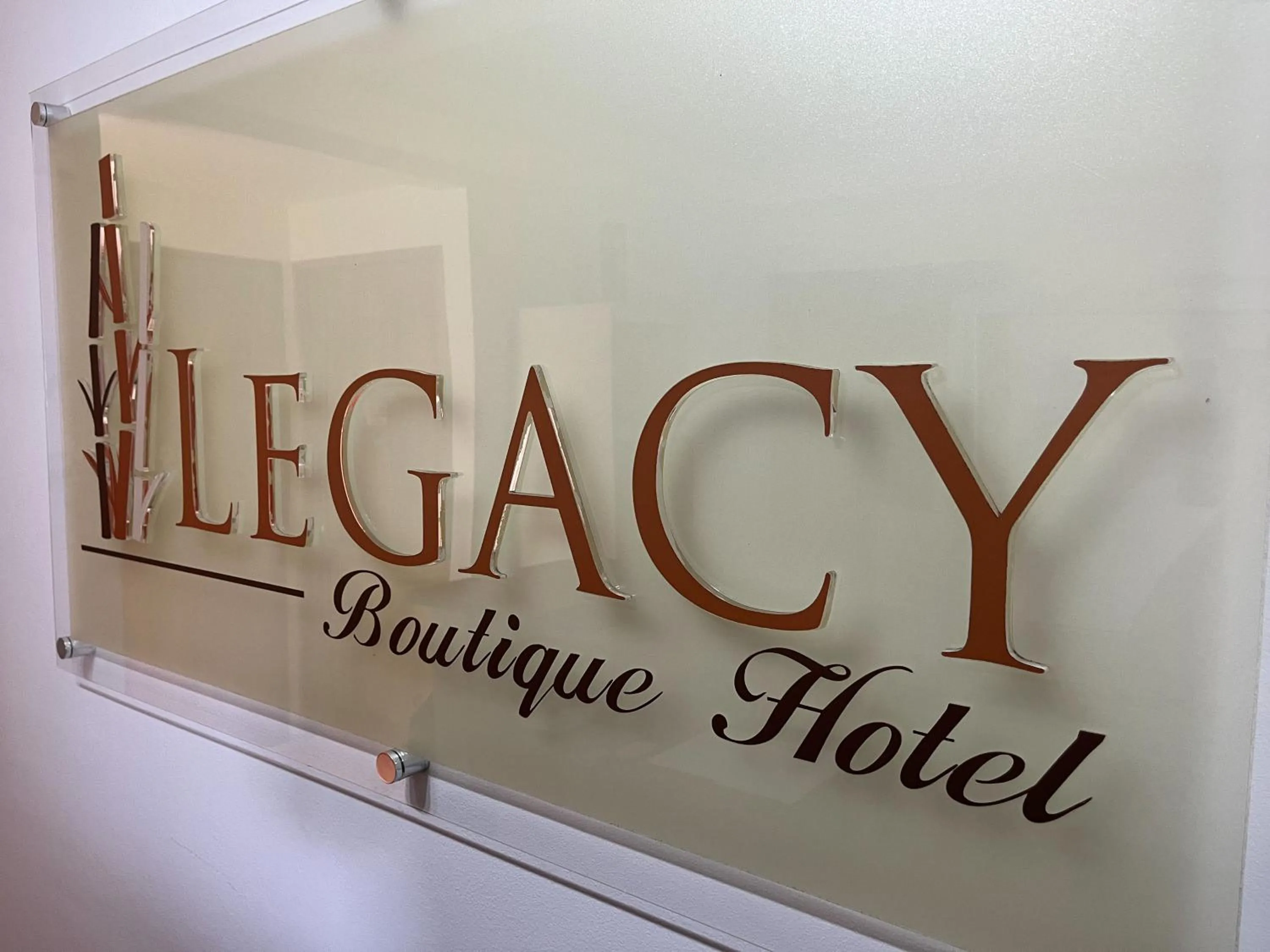 Property logo or sign in Legacy Boutique Hotel