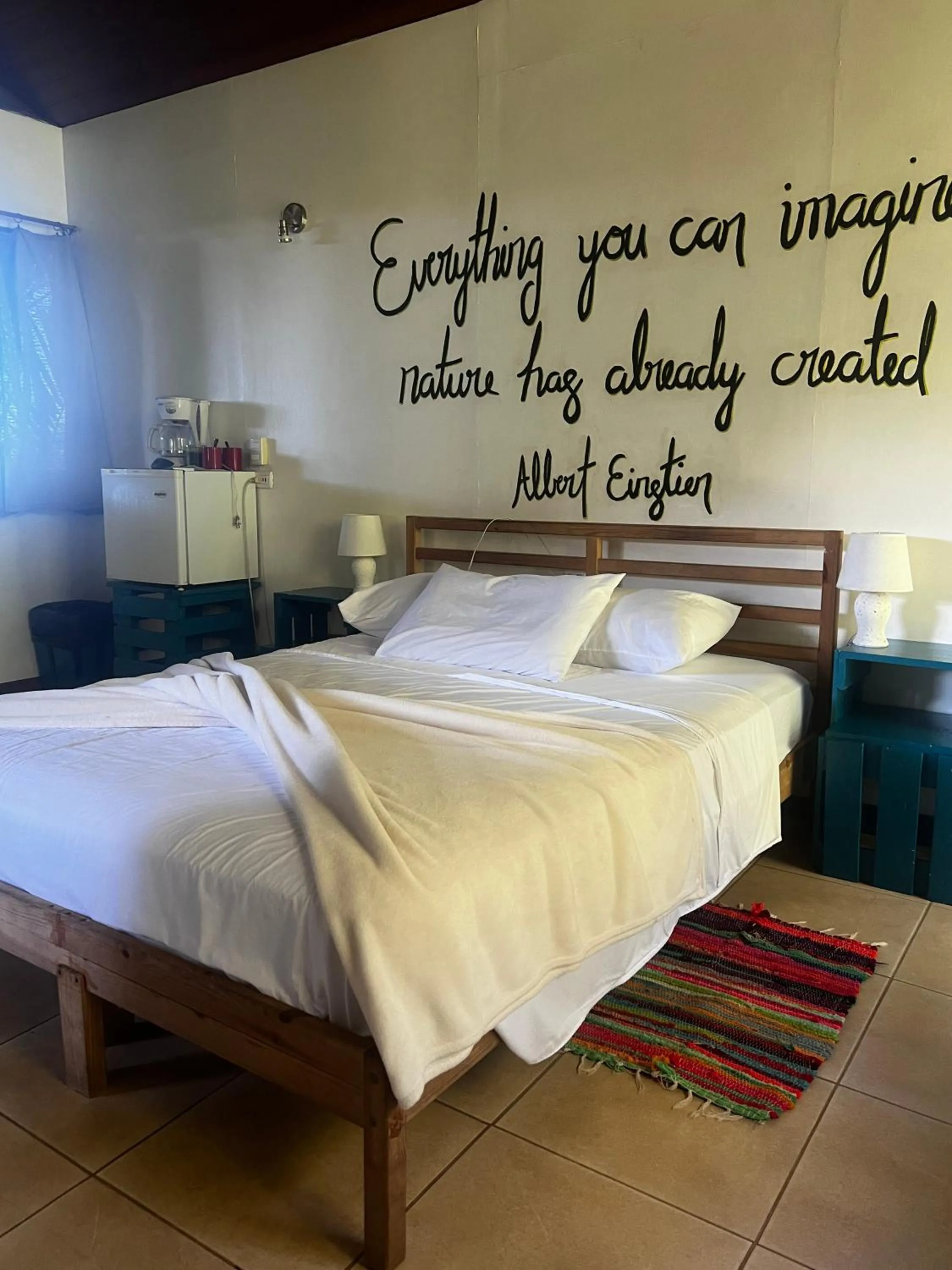 Bed in Ranchos Remo Lodge